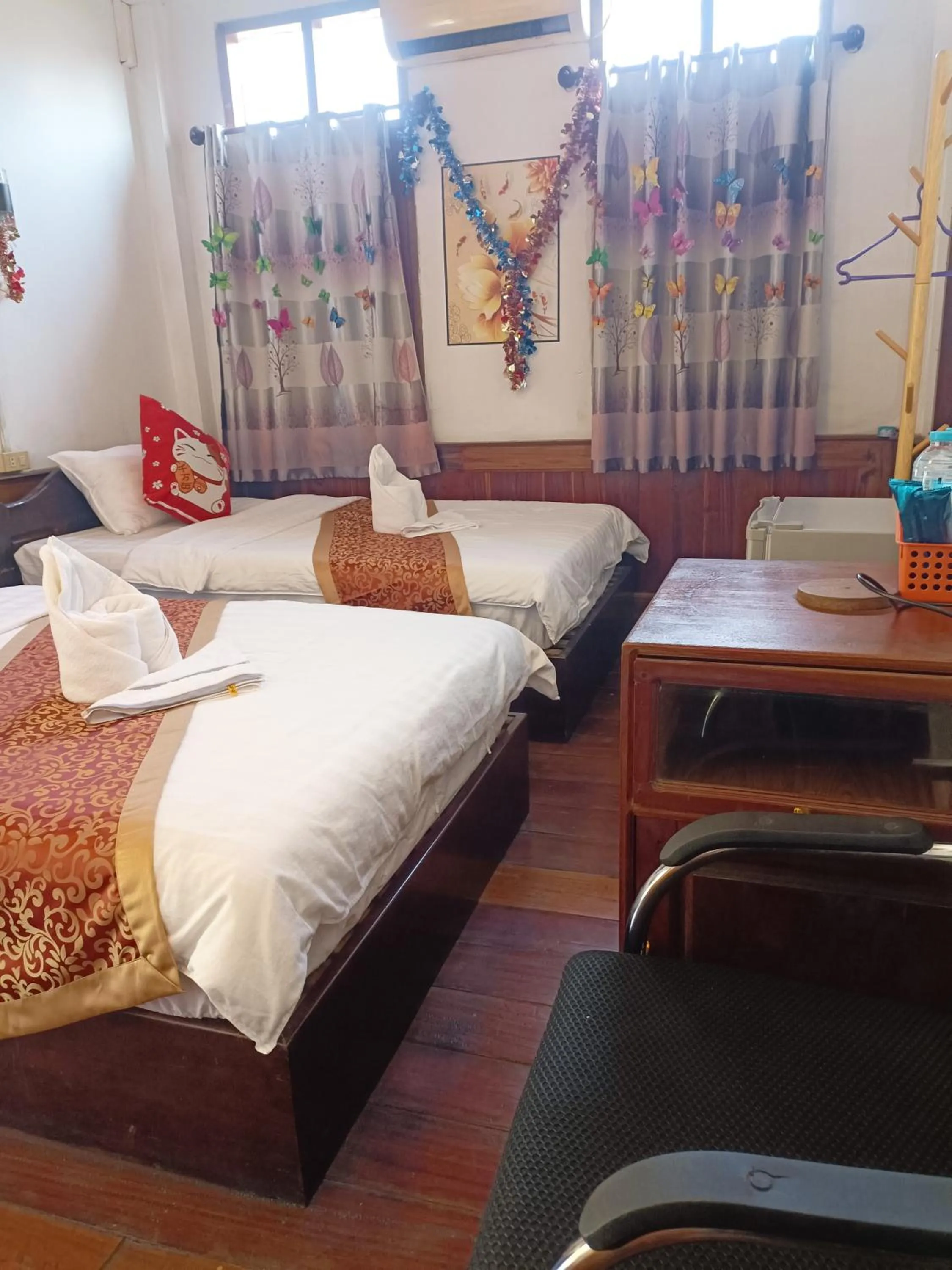 Bed in KONGKHAM GUESTHOUSE