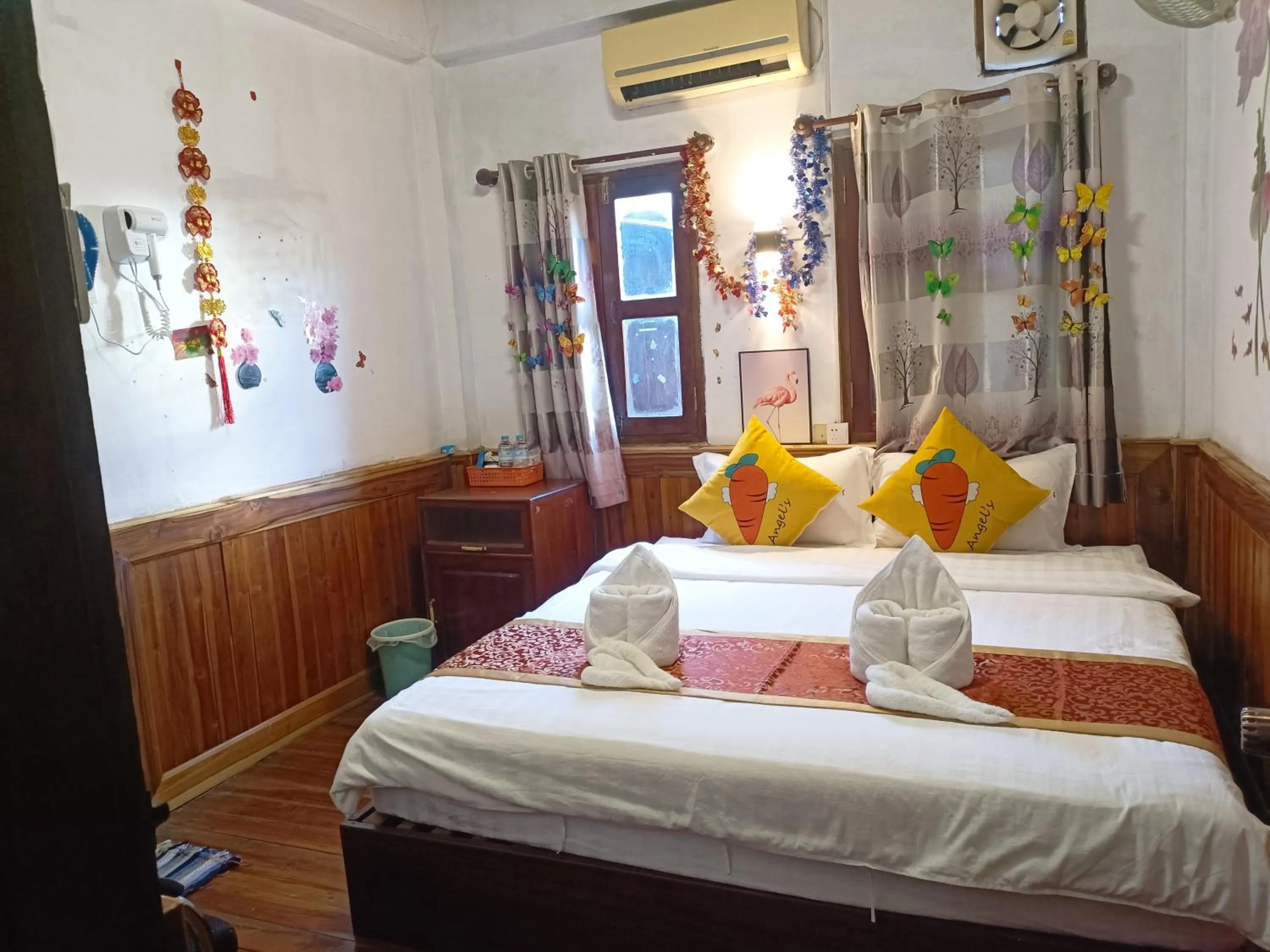 Bed in KONGKHAM GUESTHOUSE