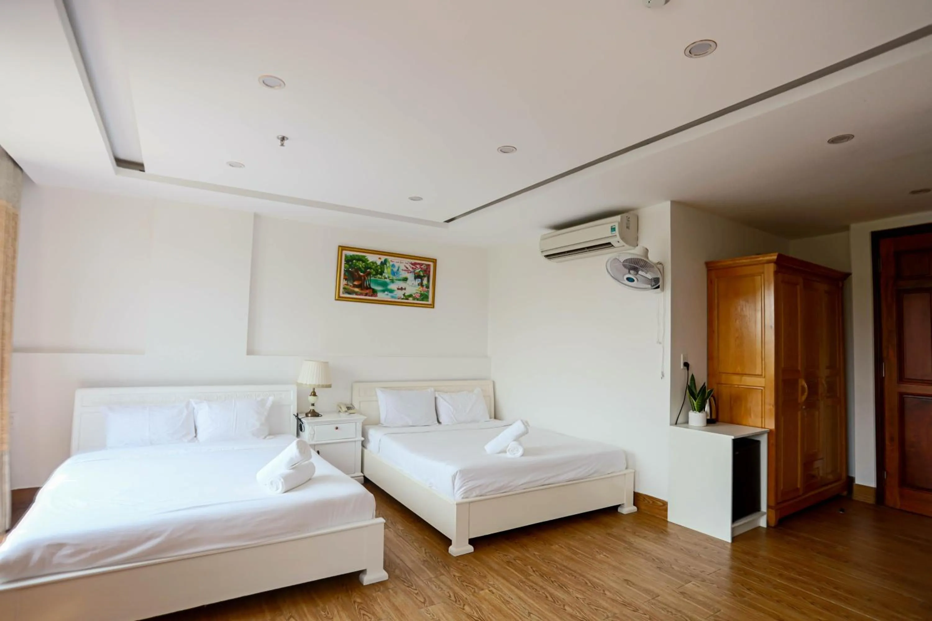 Photo of the whole room, Bed in SeaColor Beachstay Danang Hotel by Haviland