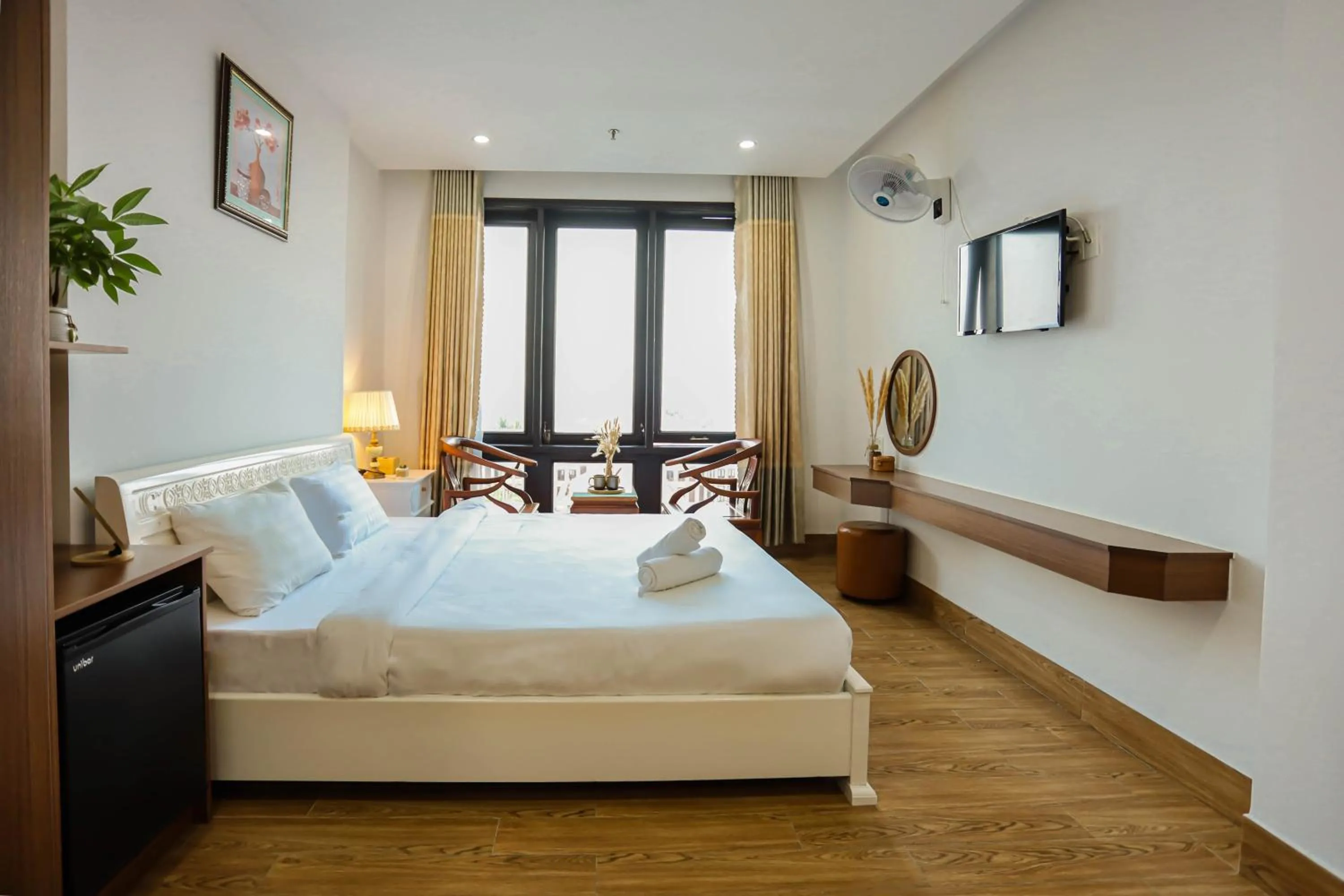 Photo of the whole room, Bed in SeaColor Beachstay Danang Hotel by Haviland