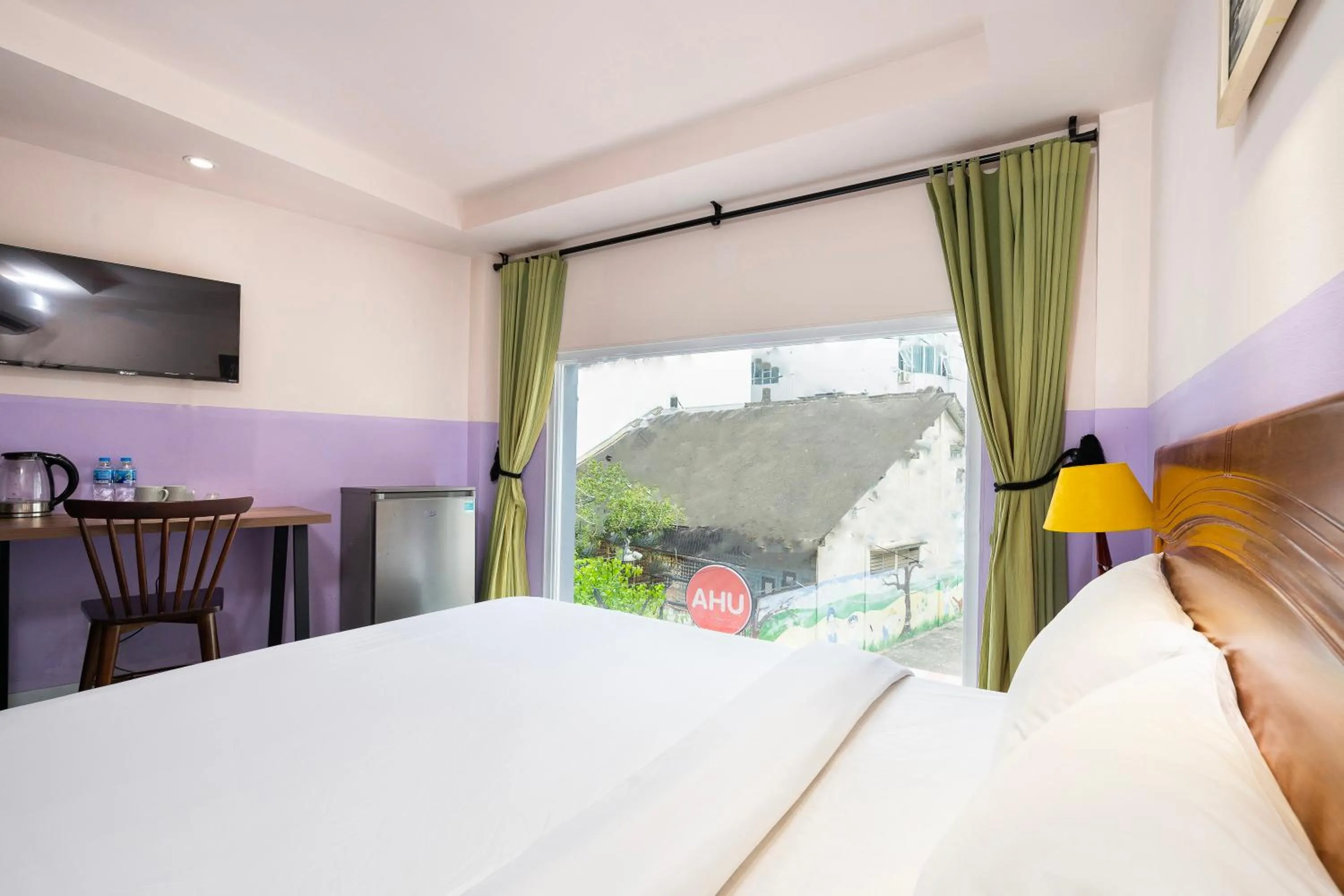 Bed in Ahu Hotel & Apartment