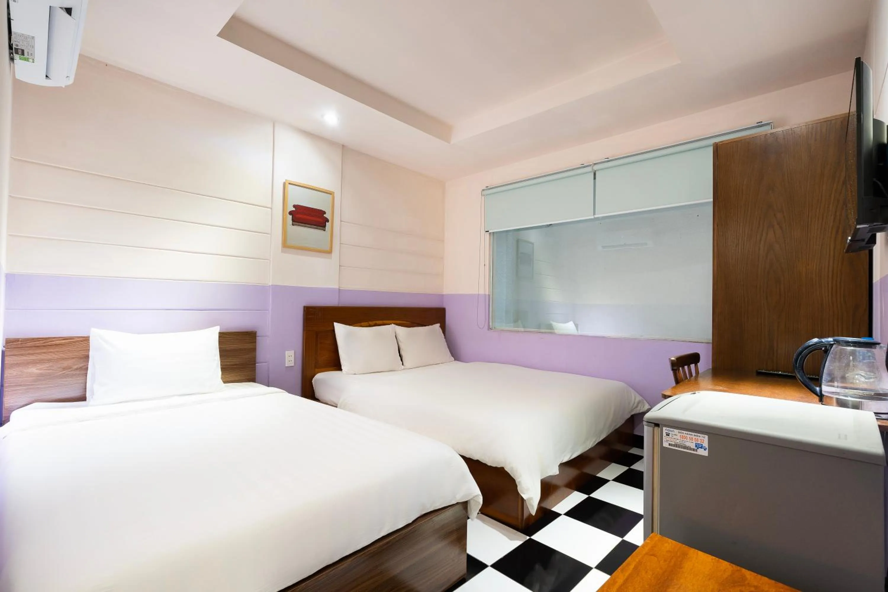 Bed in Ahu Hotel & Apartment