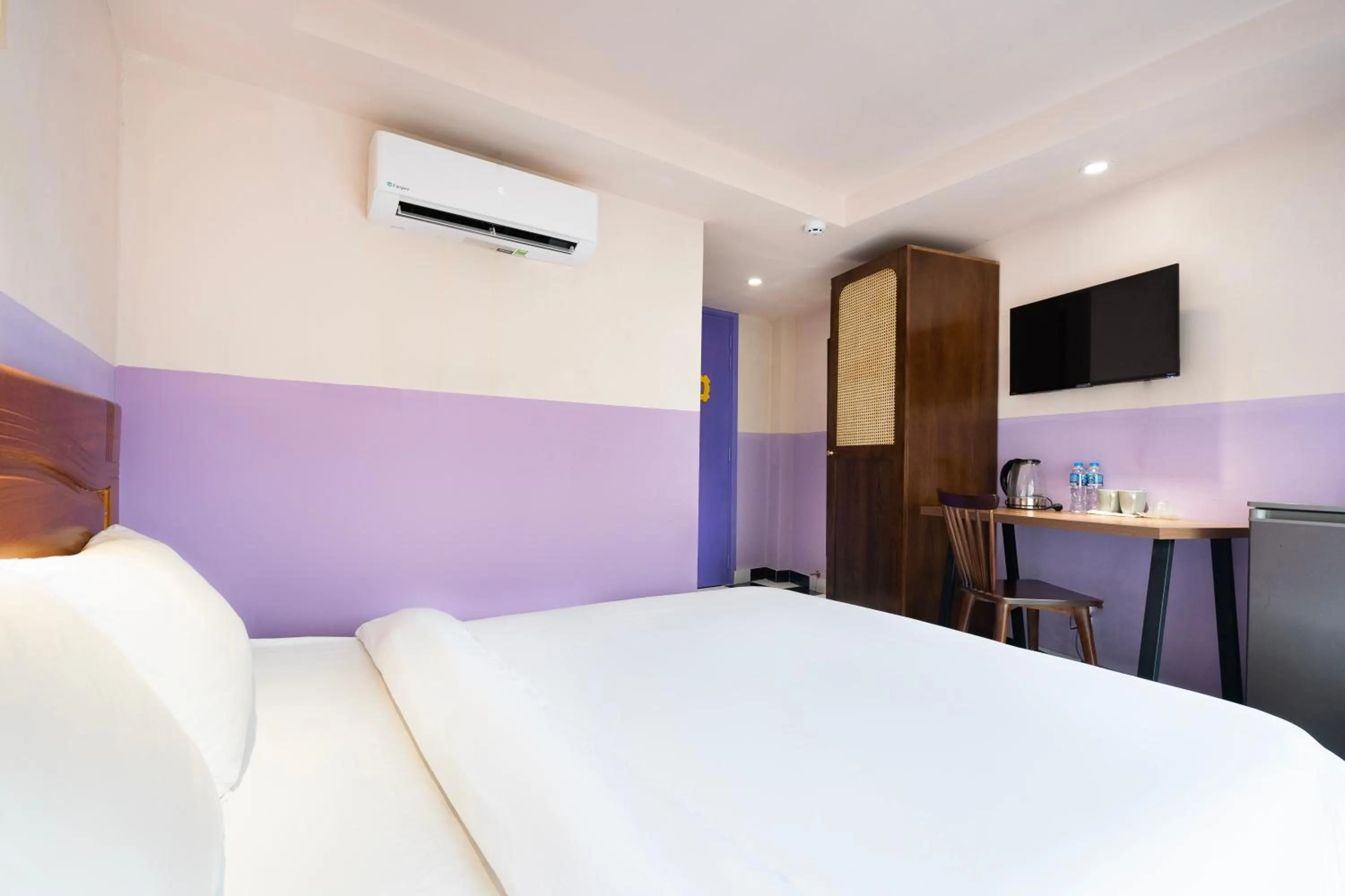 Bed in Ahu Hotel & Apartment