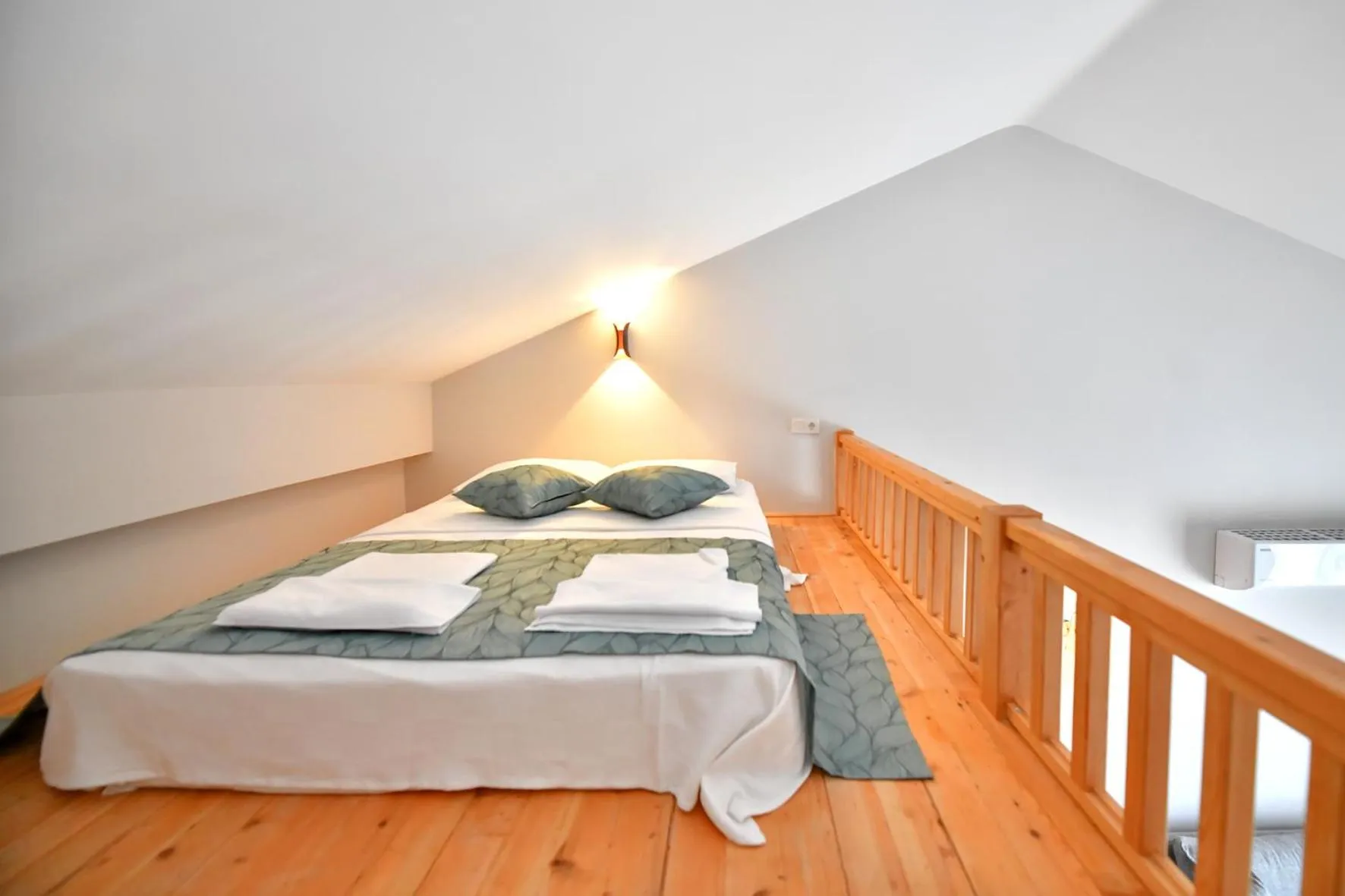 Bed in RED MOON SUITES