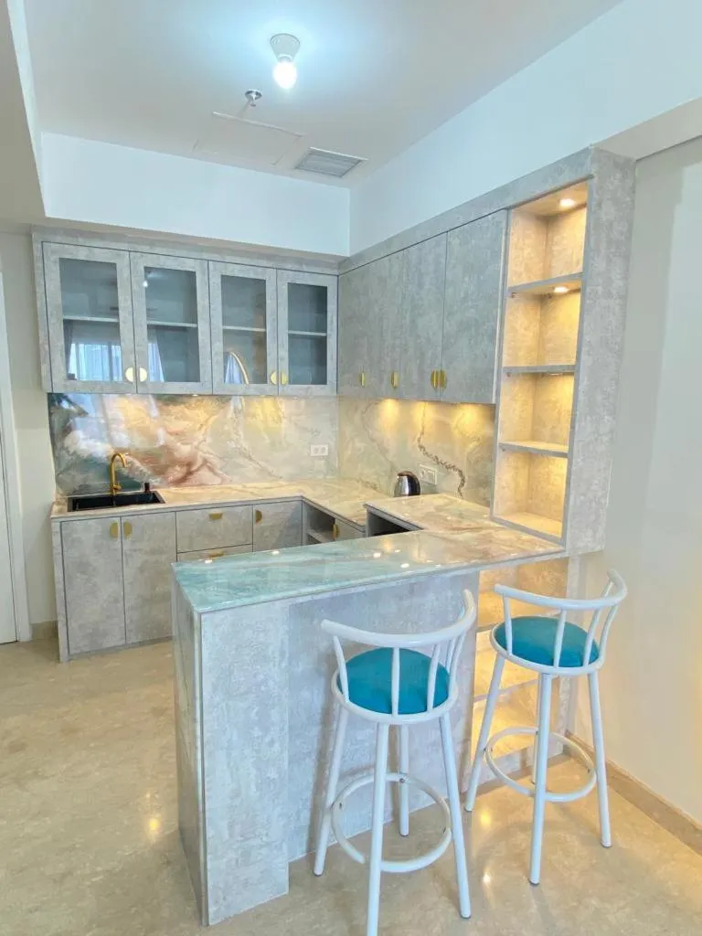 Kitchen or kitchenette in Apartment Podomoro Medan