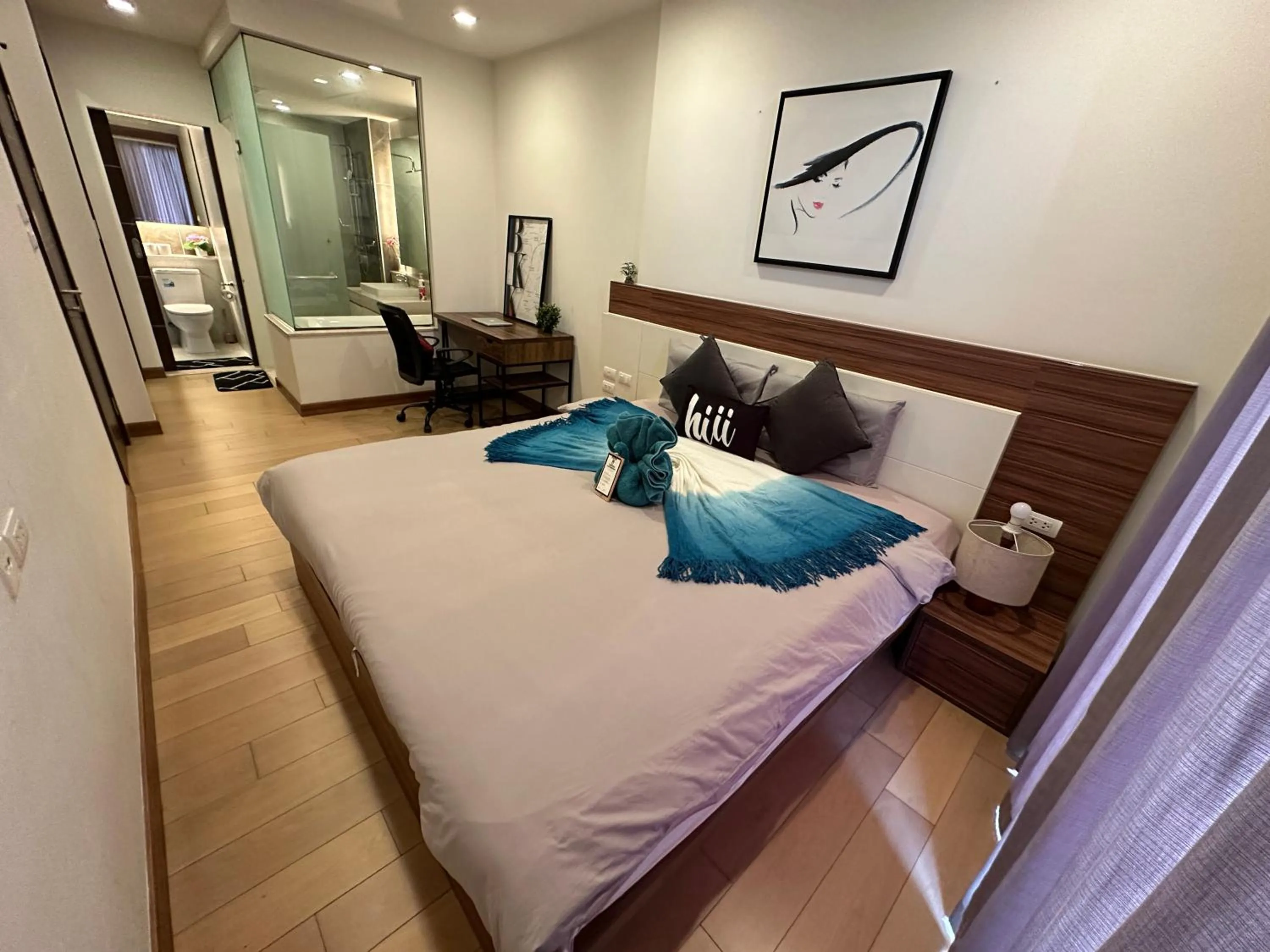 Bed in The Astra Condo Changkhlan in Chiang Mai