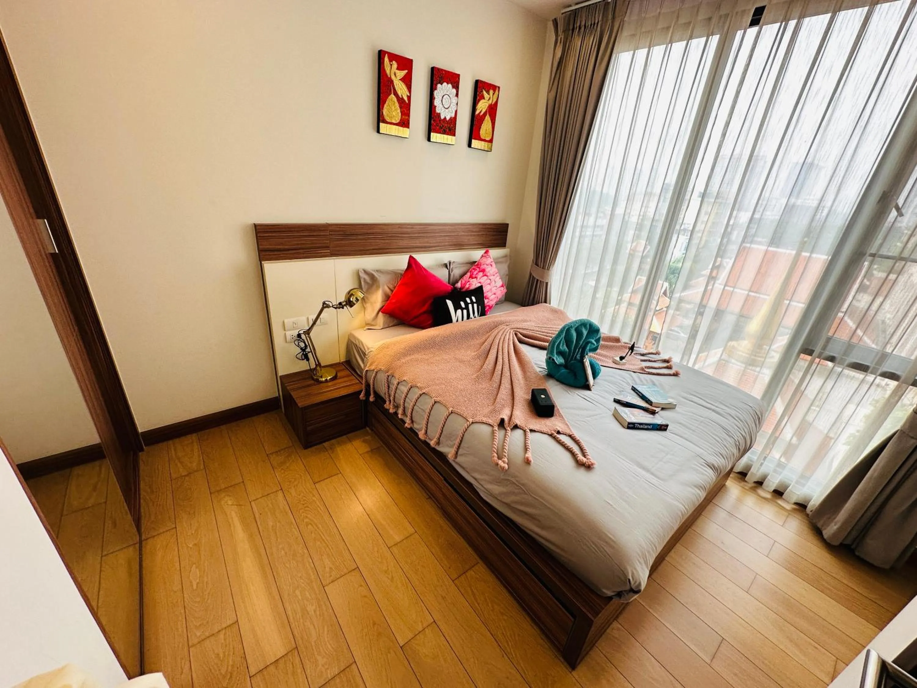 Bed in The Astra Condo Changkhlan in Chiang Mai