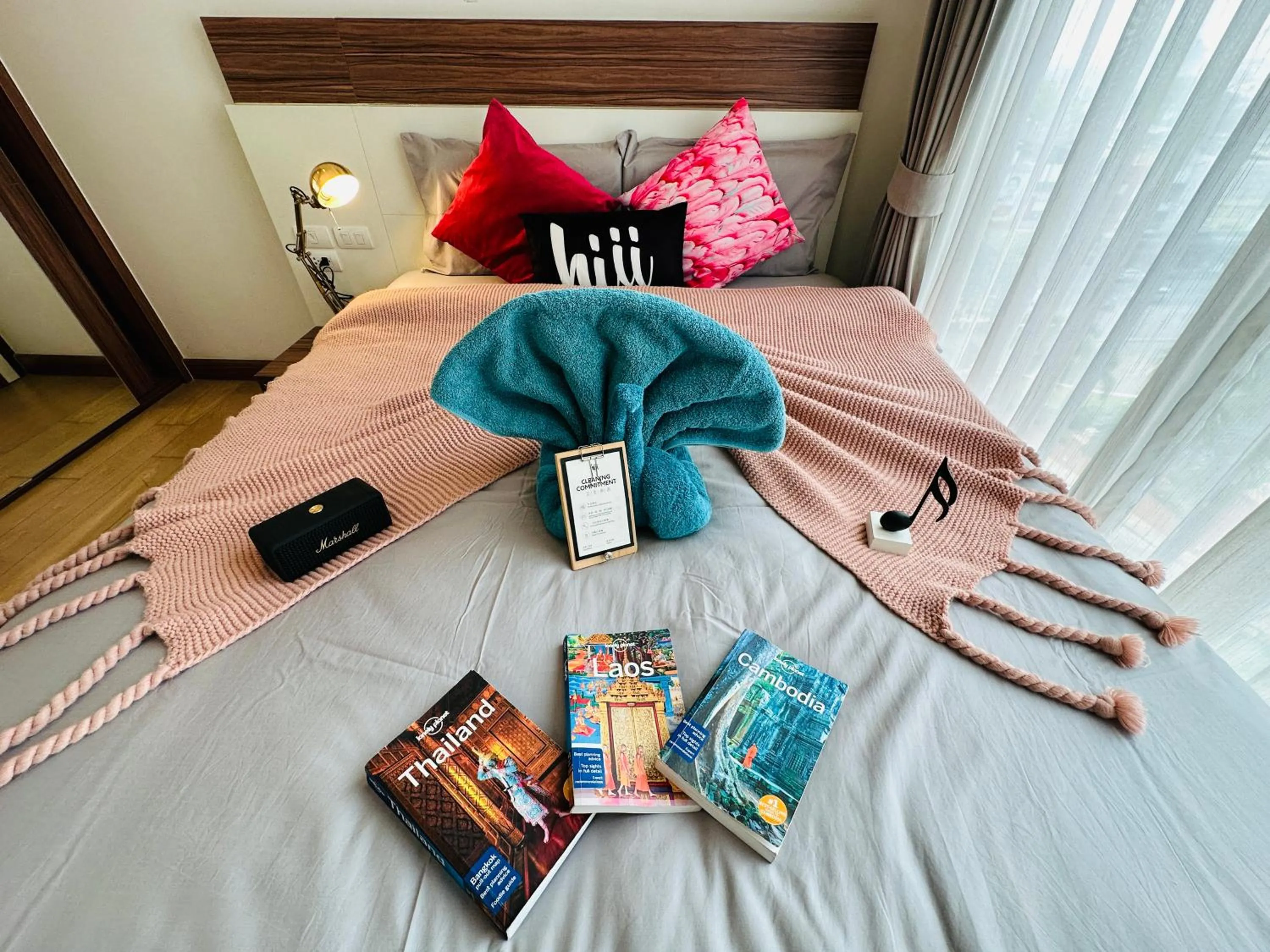 Bed in The Astra Condo Changkhlan in Chiang Mai