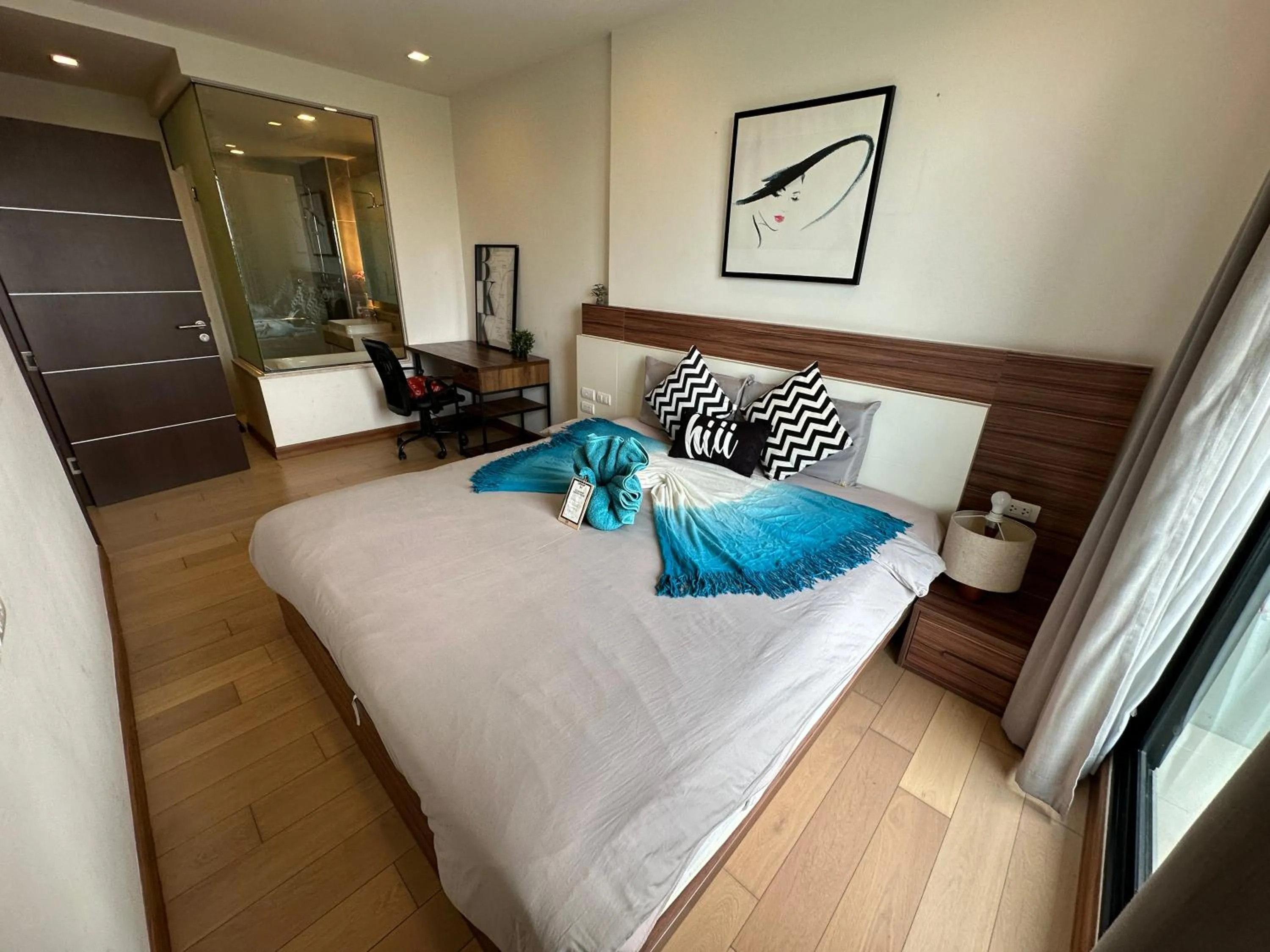 Bed in The Astra Condo Changkhlan in Chiang Mai