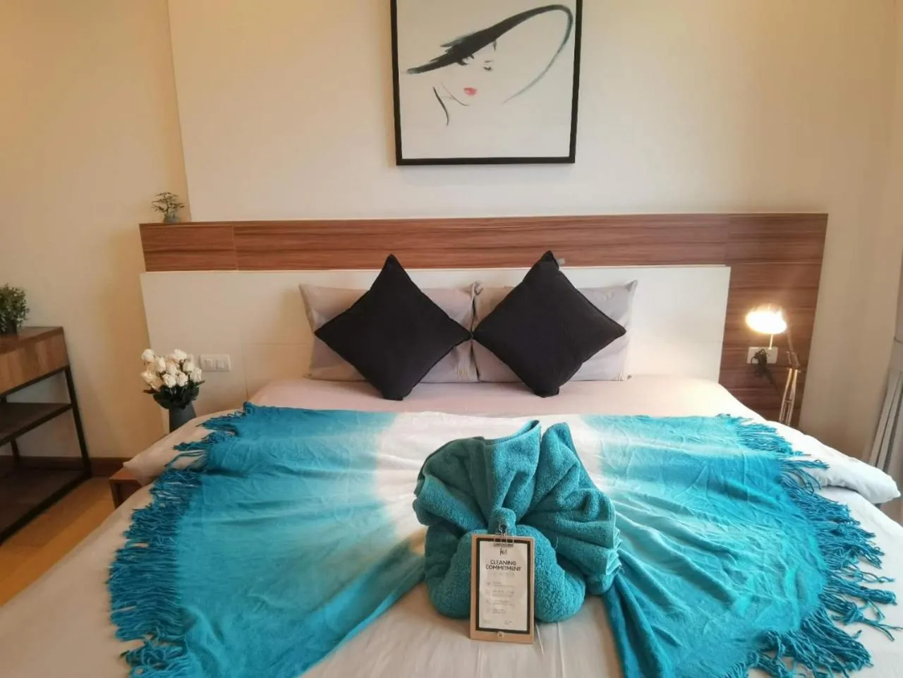 Bed in The Astra Condo Changkhlan in Chiang Mai