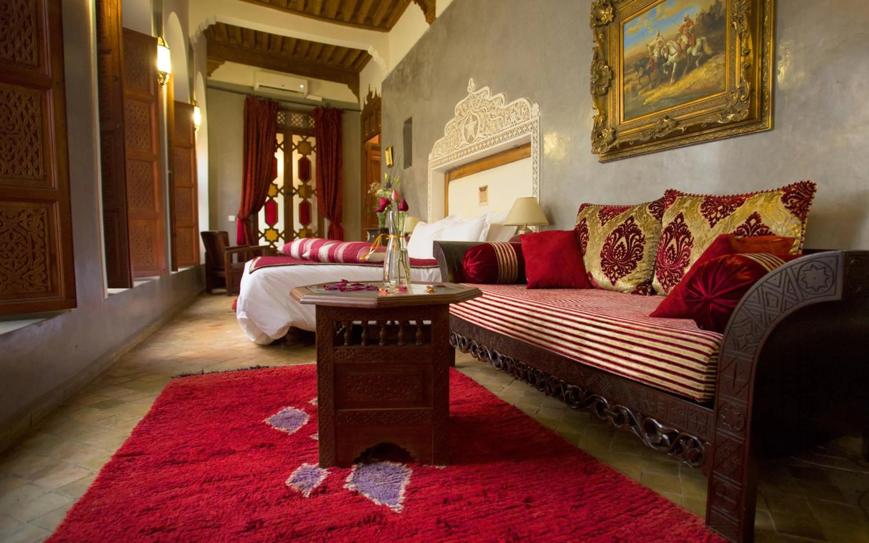 Living room, Bed in Riad Dar Zaya