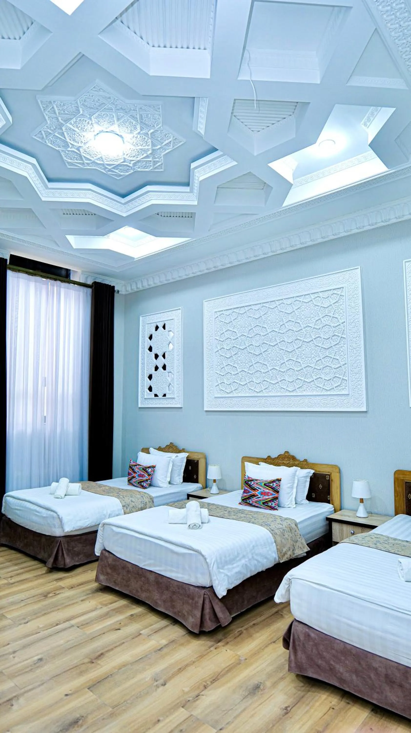 Bed in KABIR HOTEL
