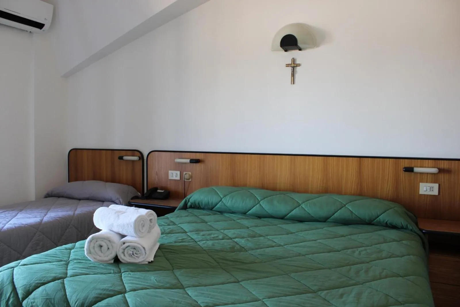 Bed in Hotel Crocenzi