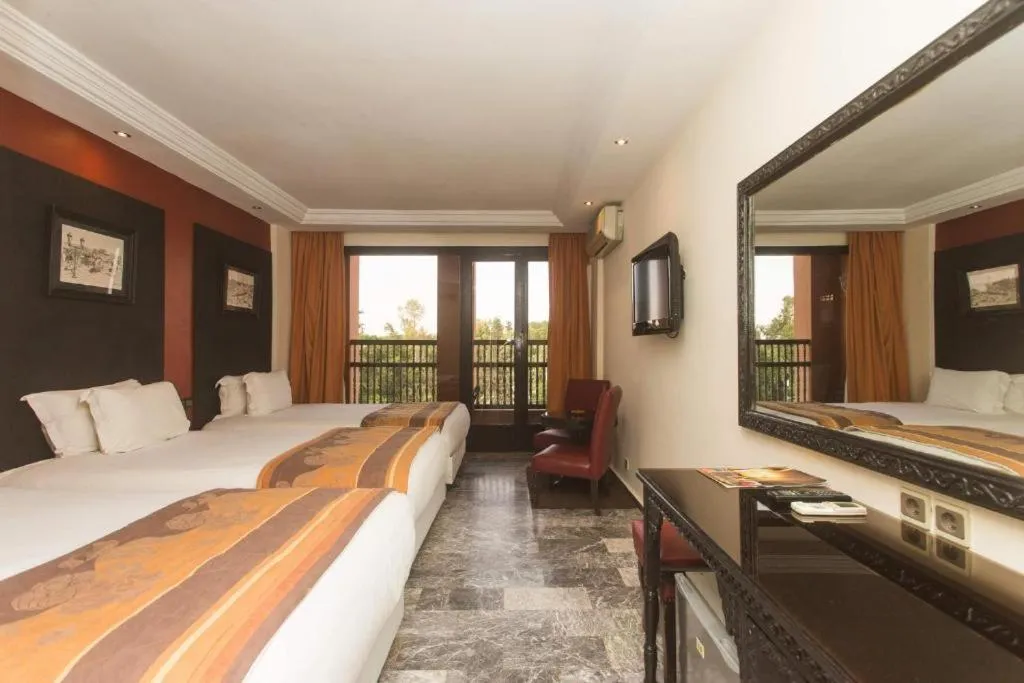 Bed in El Andalous Lounge & Spa Hotel