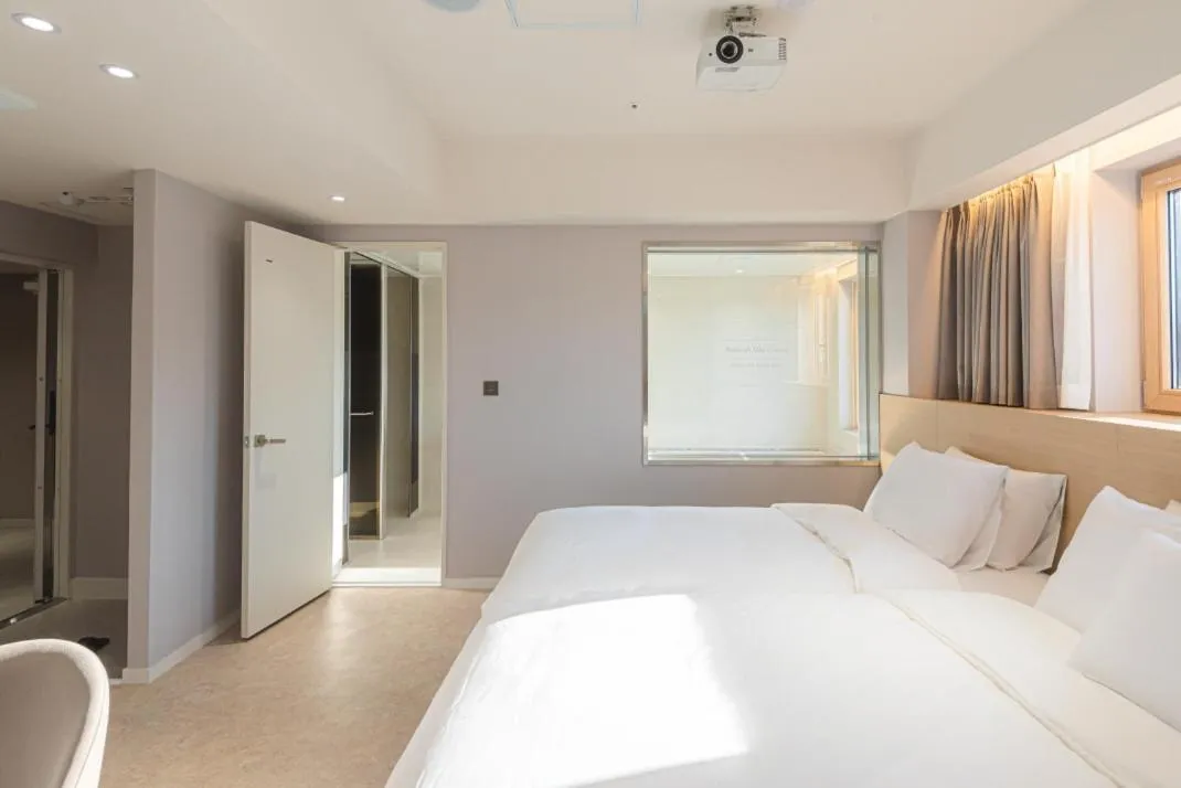 Bed in Asherah Villa d' aqua Hotel