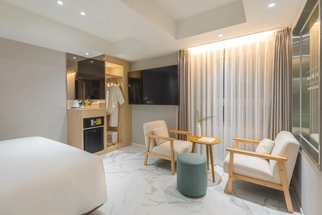 Bed in Asherah Villa d' aqua Hotel