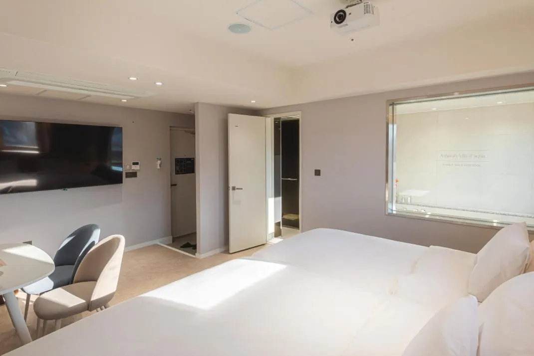 Bed in Asherah Villa d' aqua Hotel