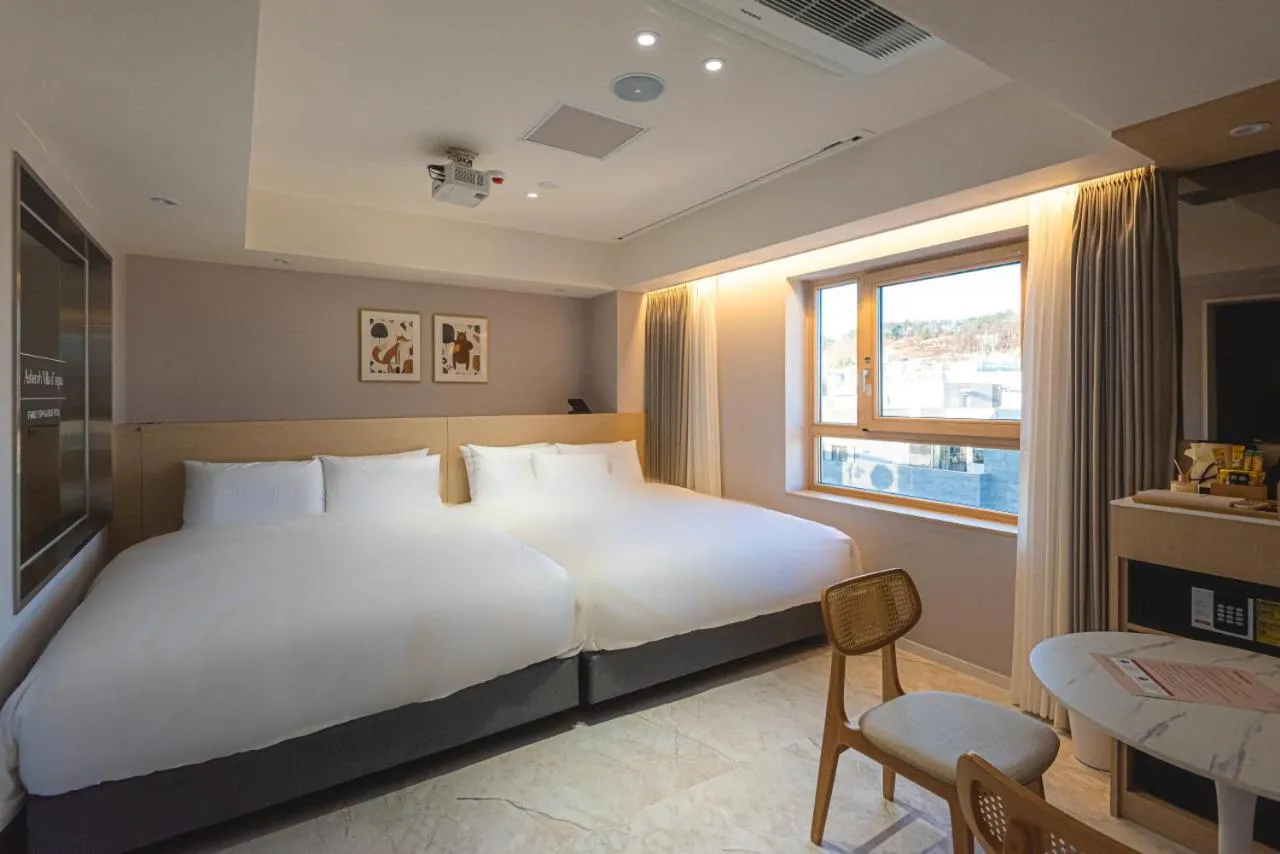 Bed in Asherah Villa d' aqua Hotel