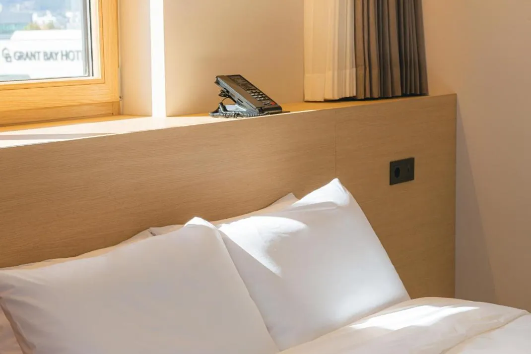 Bed in Asherah Villa d' aqua Hotel