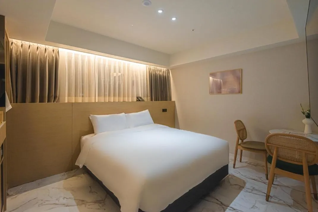 Bed in Asherah Villa d' aqua Hotel