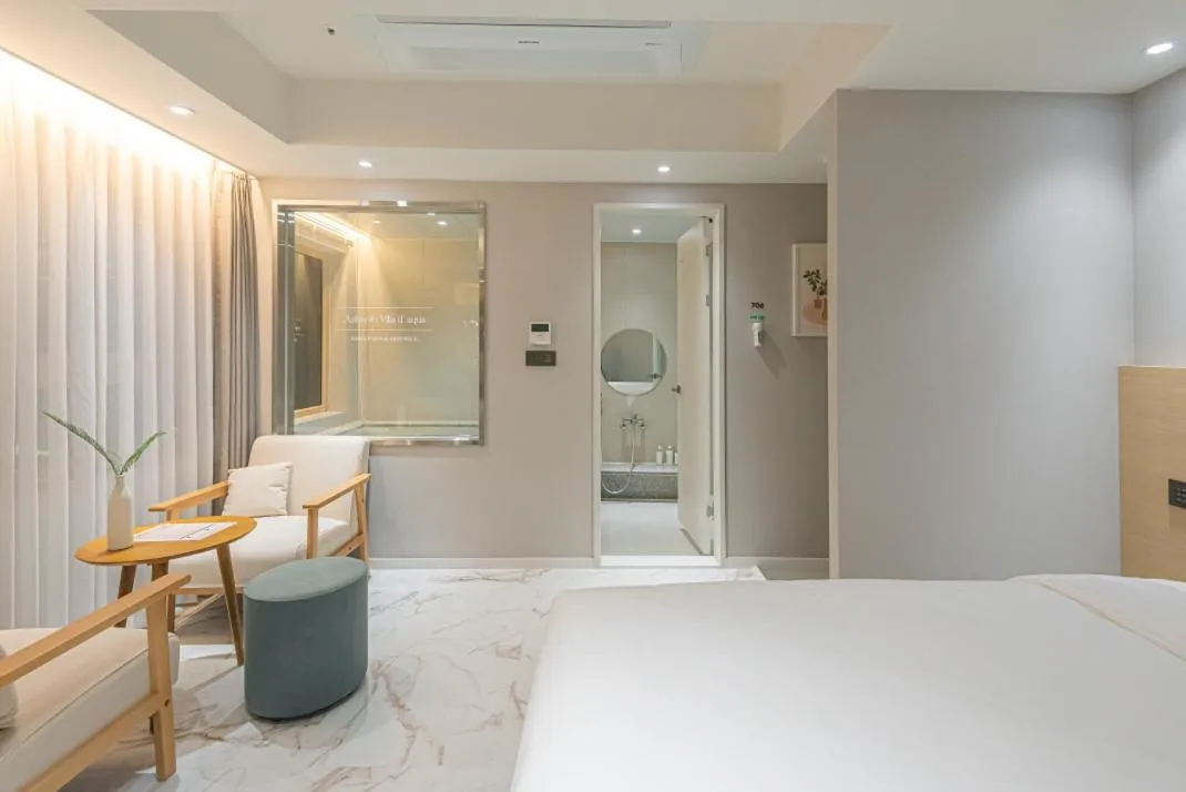 Bed in Asherah Villa d' aqua Hotel