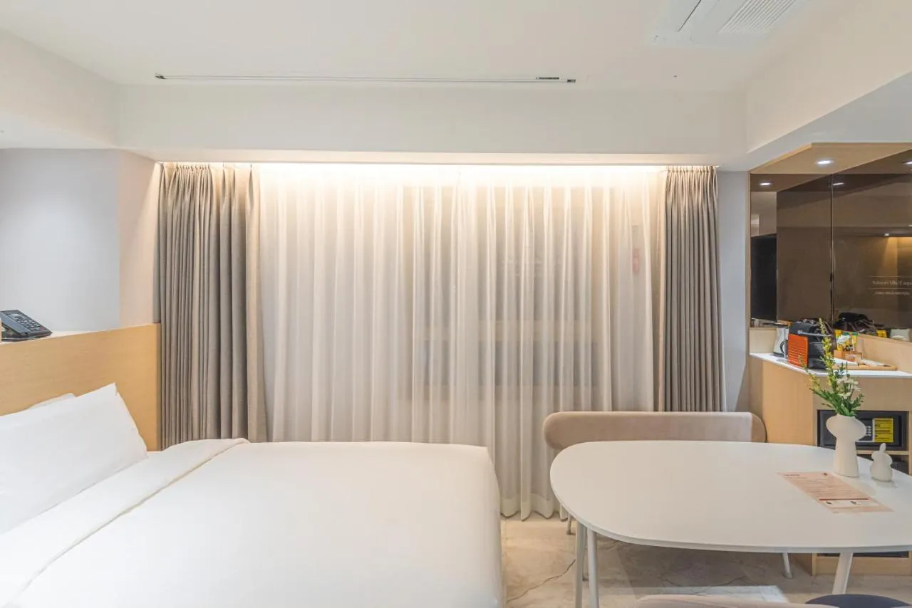 Bed in Asherah Villa d' aqua Hotel