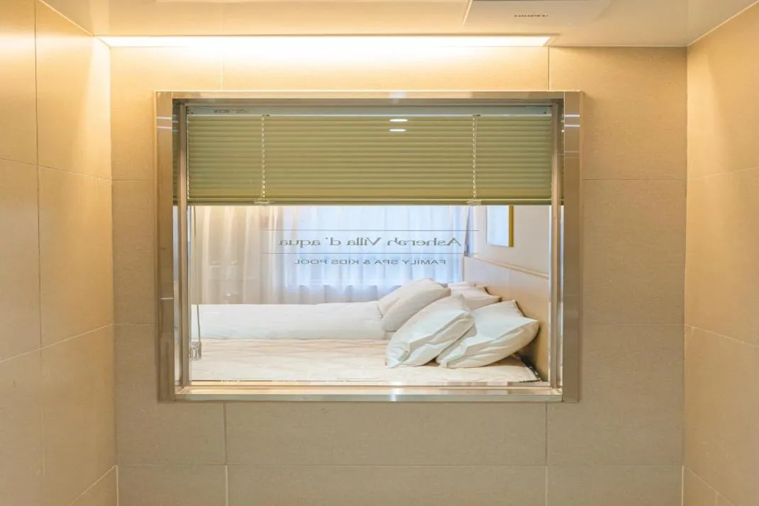 Bed in Asherah Villa d' aqua Hotel