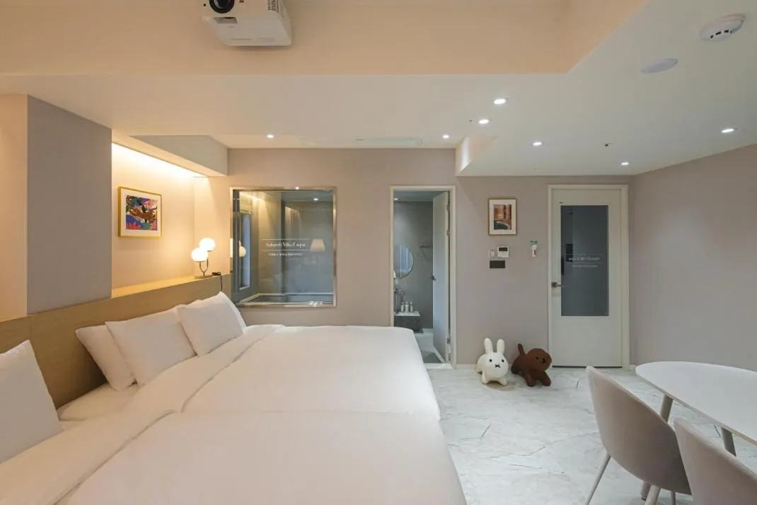 Bed in Asherah Villa d' aqua Hotel