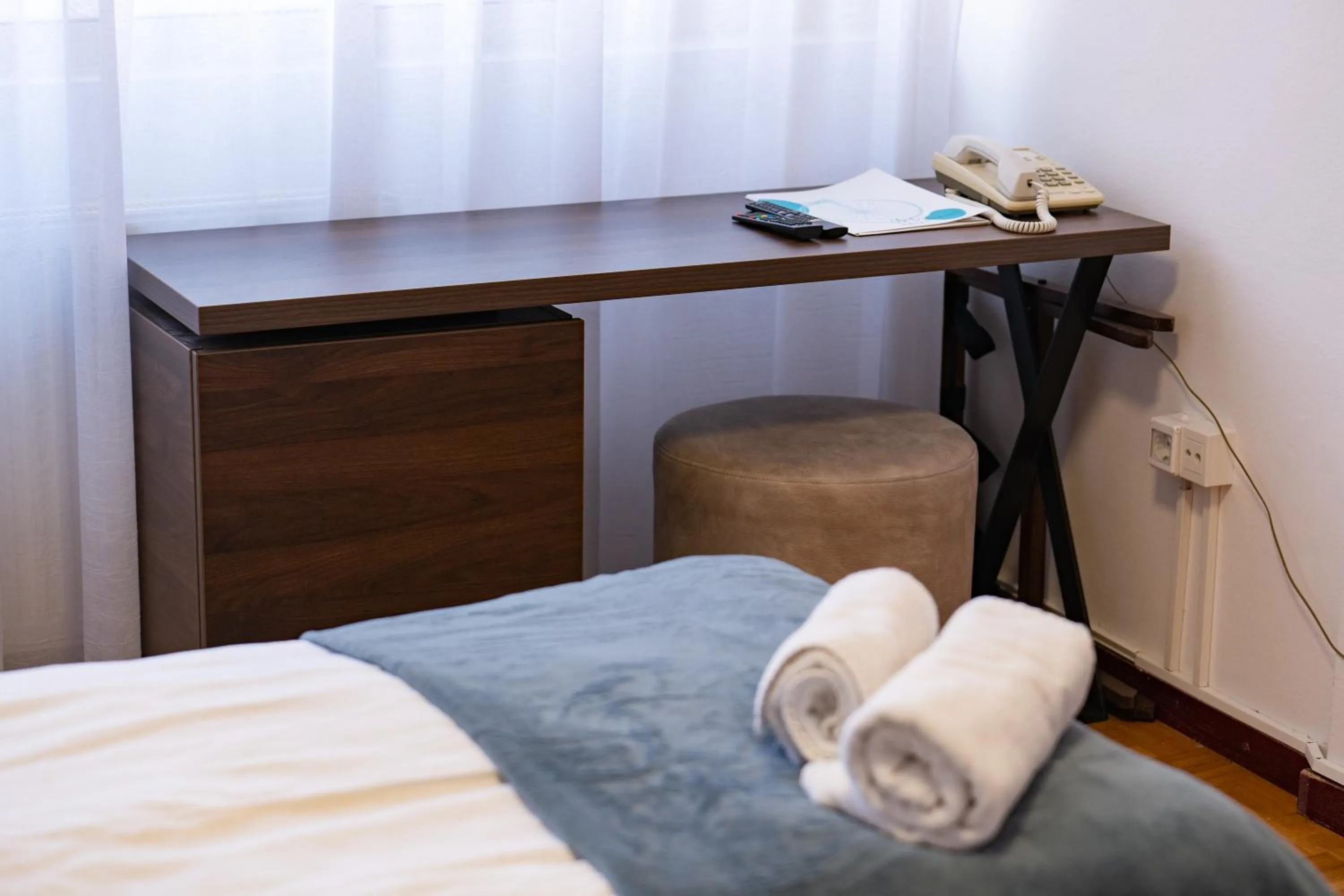 Bed in Artearia Hotel