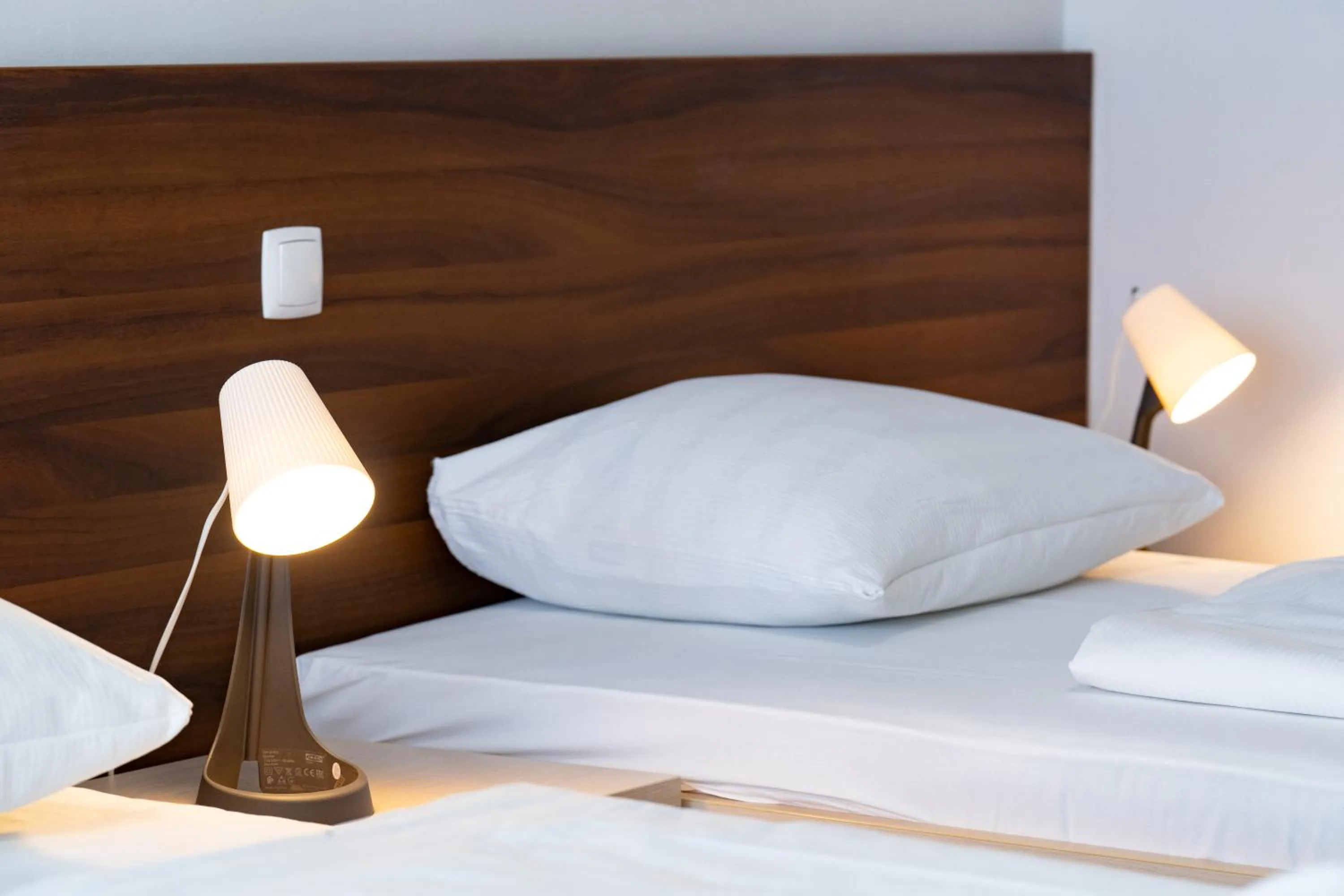 Bed in Artearia Hotel