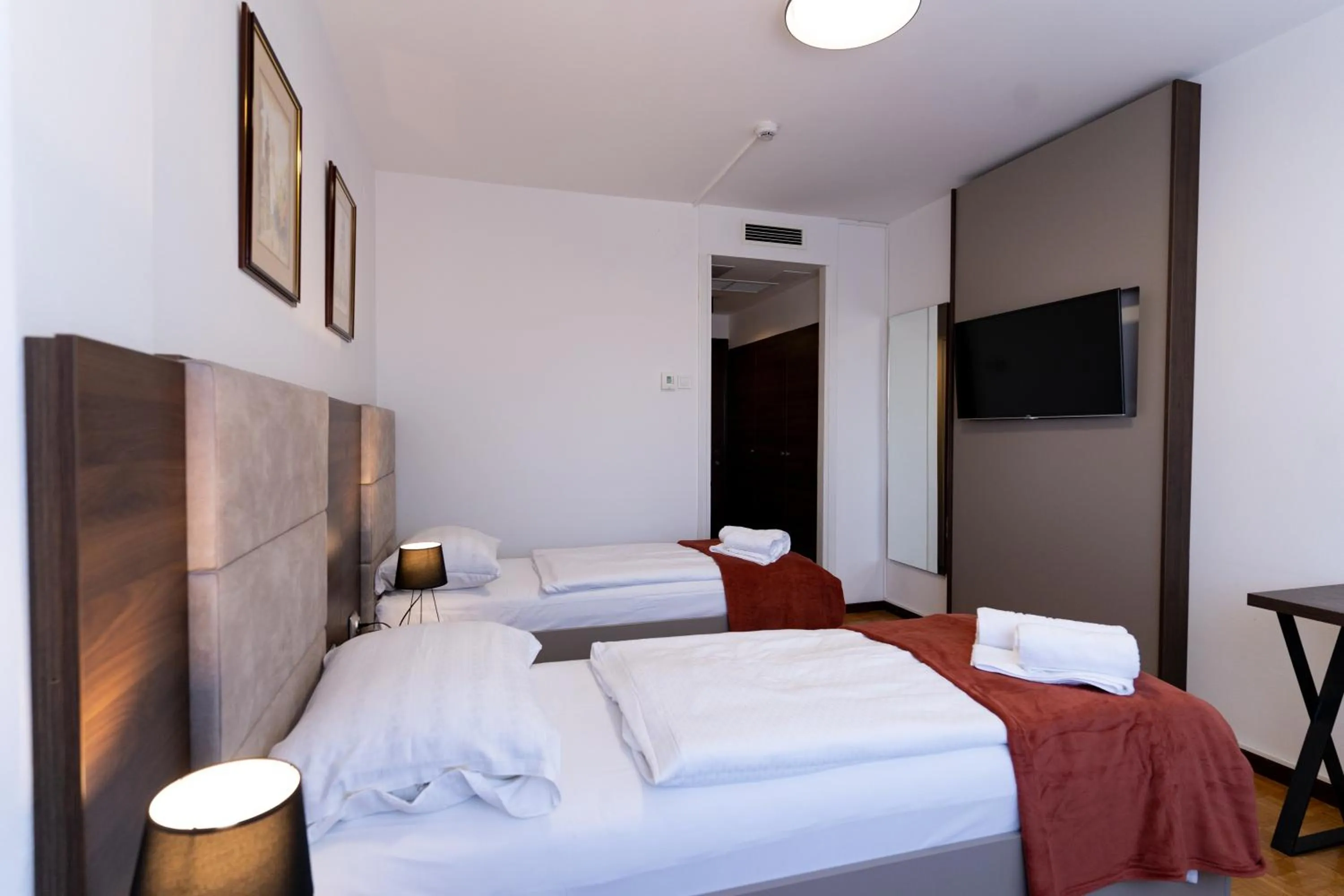 Bed in Artearia Hotel