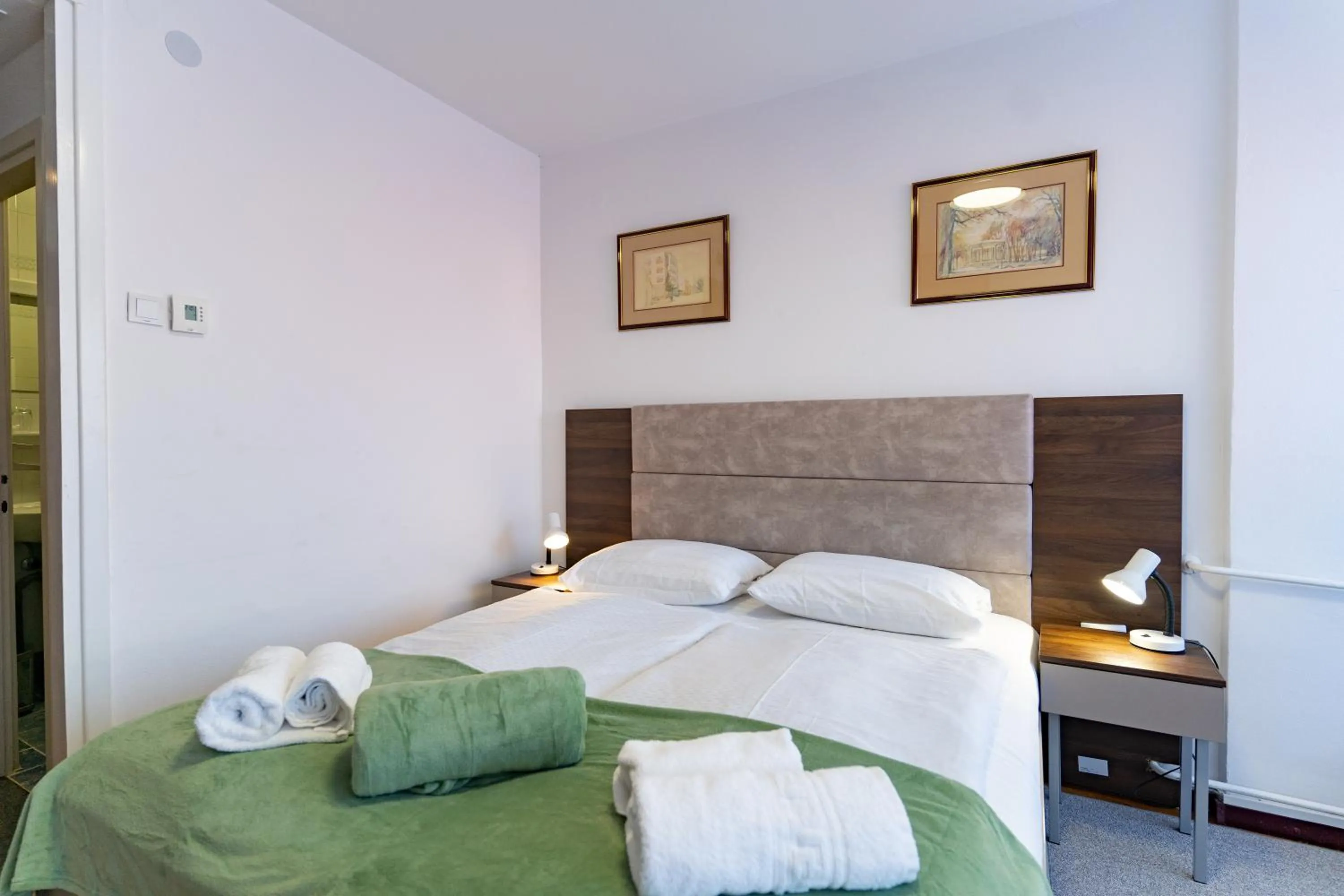 Bed in Artearia Hotel