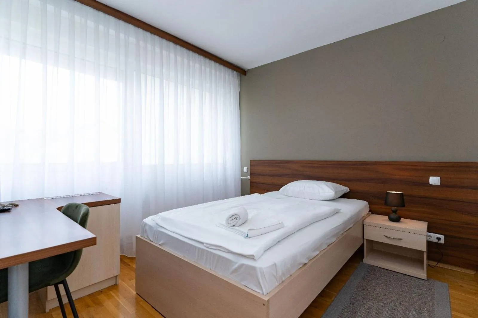 Bed in Artearia Hotel