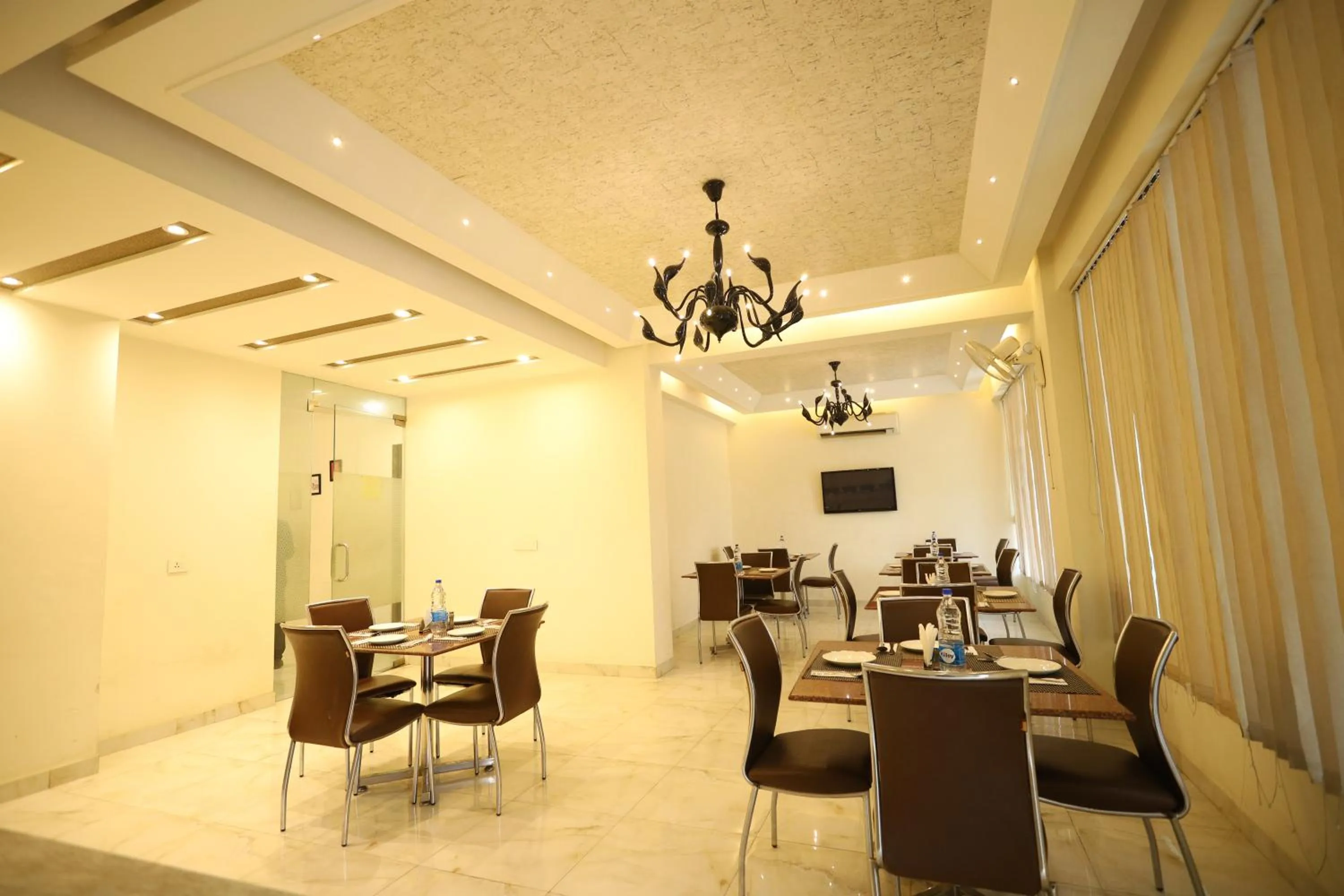 Dining area in Asian Suites Cyber Park Gurgaon