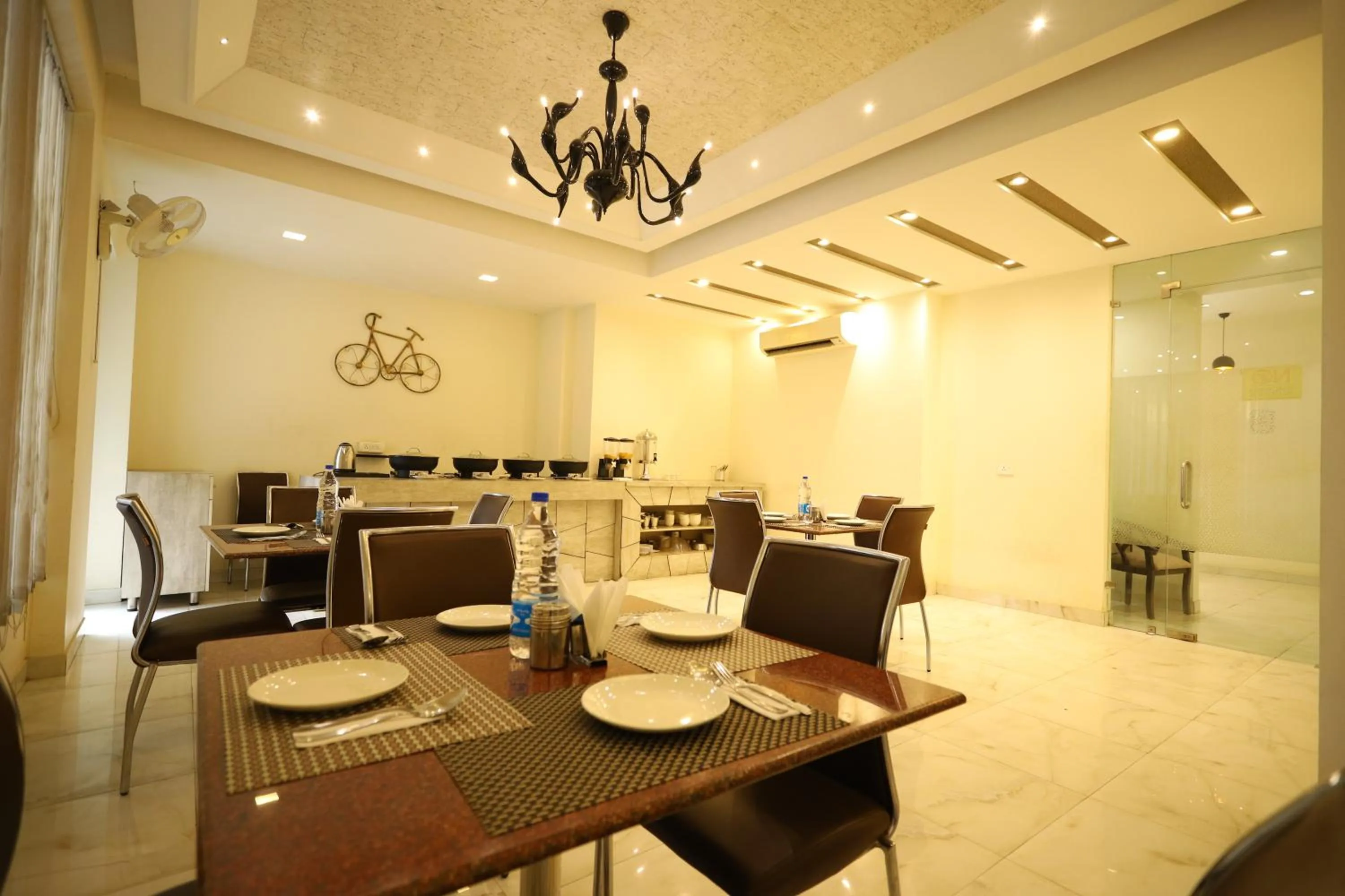 Dining area in Asian Suites Cyber Park Gurgaon