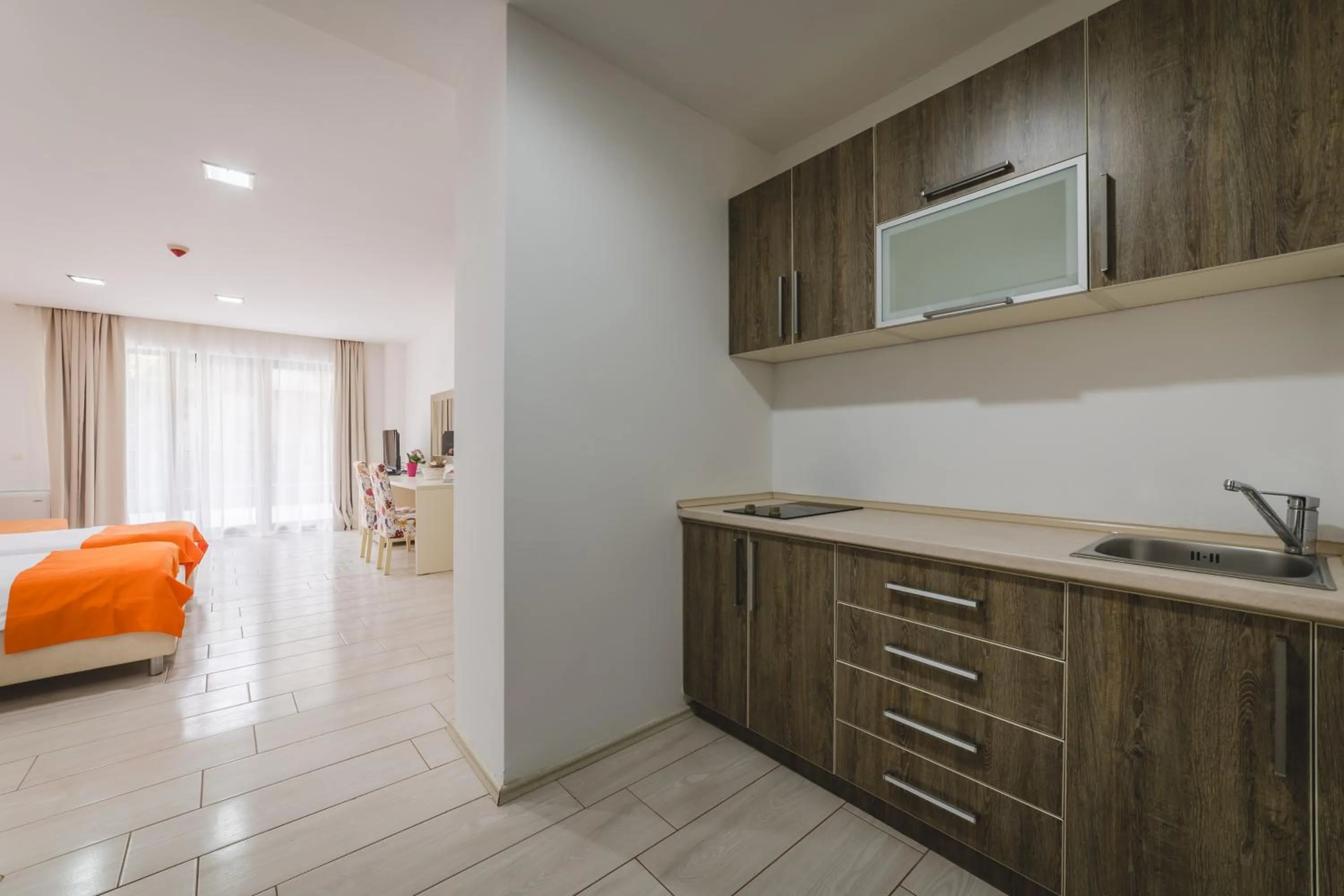 Kitchen or kitchenette, Bed in Hotel & Apartments HEC Residence