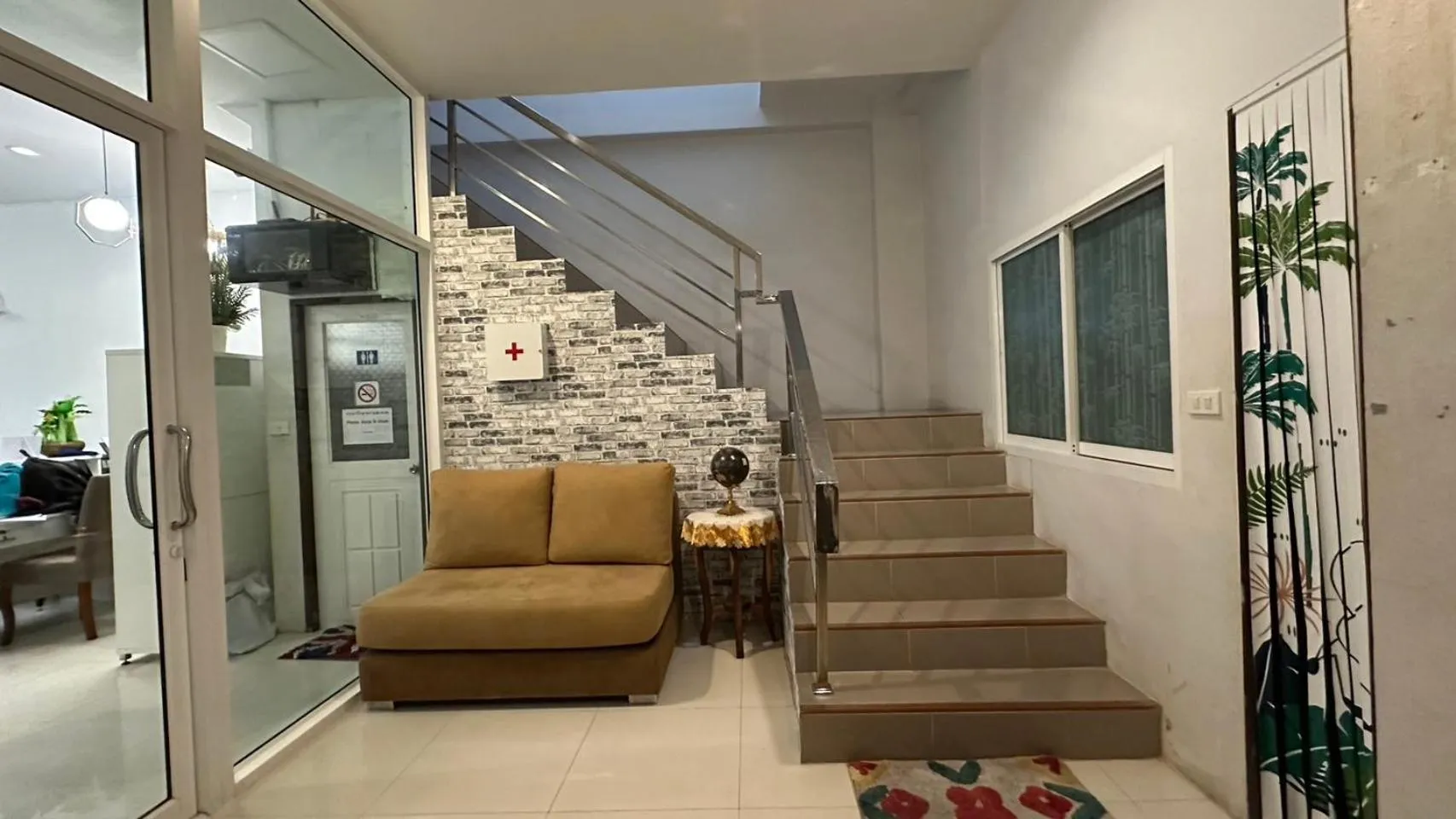 Seating area in COZY Residence Patong