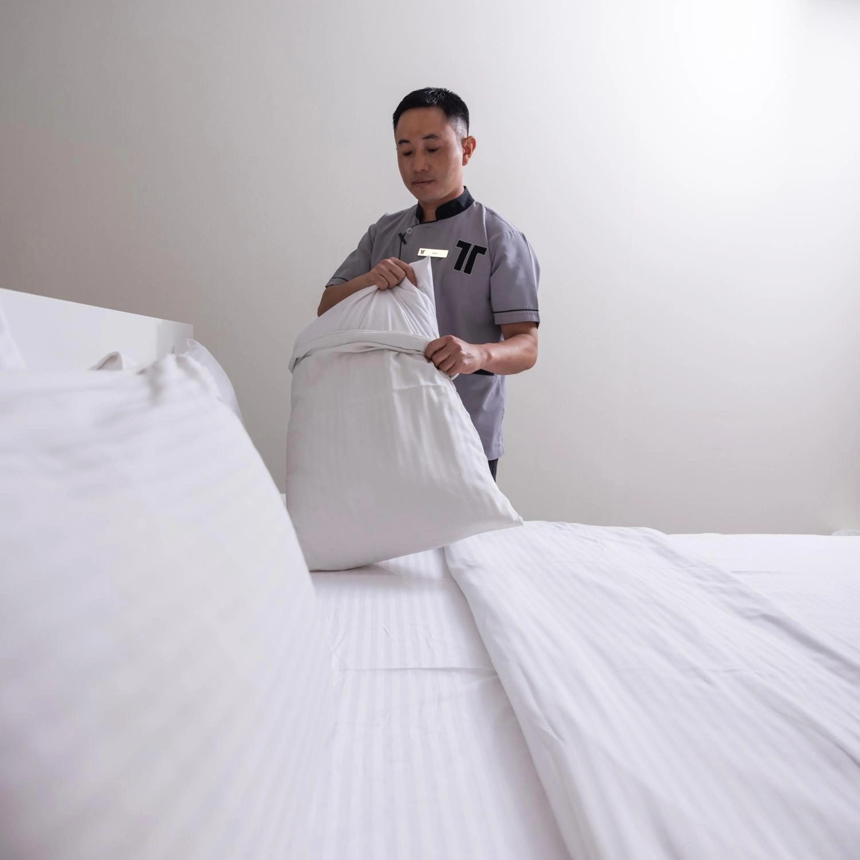 Bed in Riggae Tower Hotel