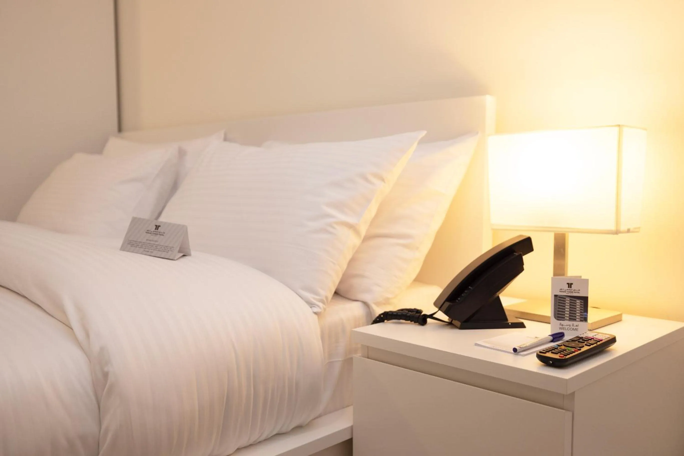 Bed in Riggae Tower Hotel