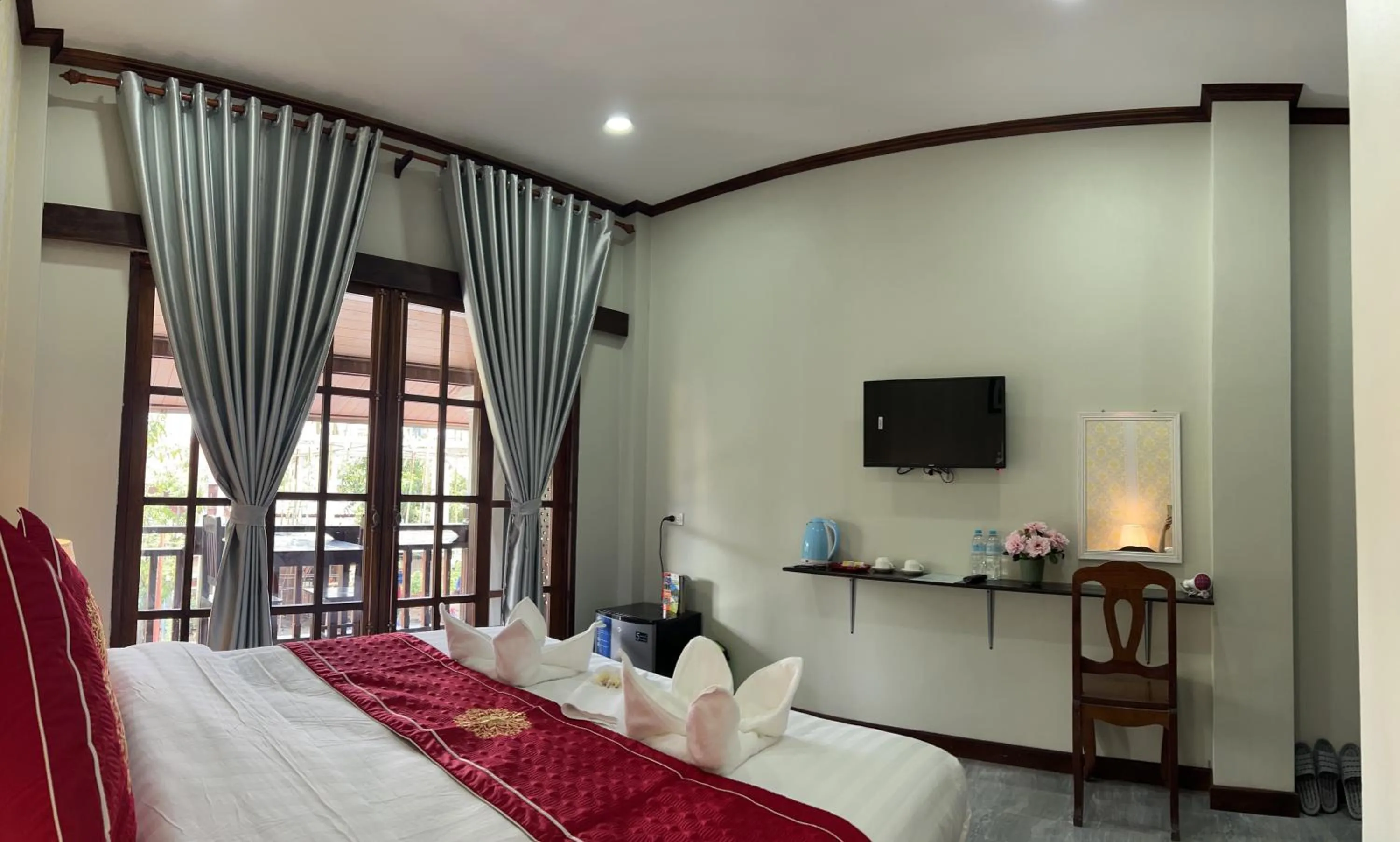 Bed in Le KhounSok Boutique Hotel