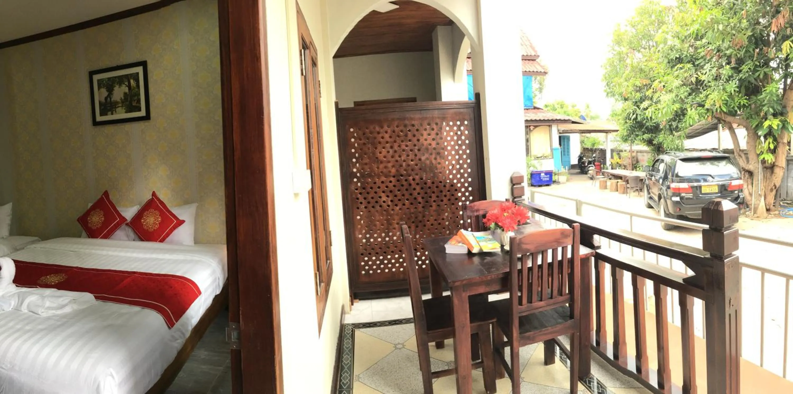 Bed in Le KhounSok Boutique Hotel