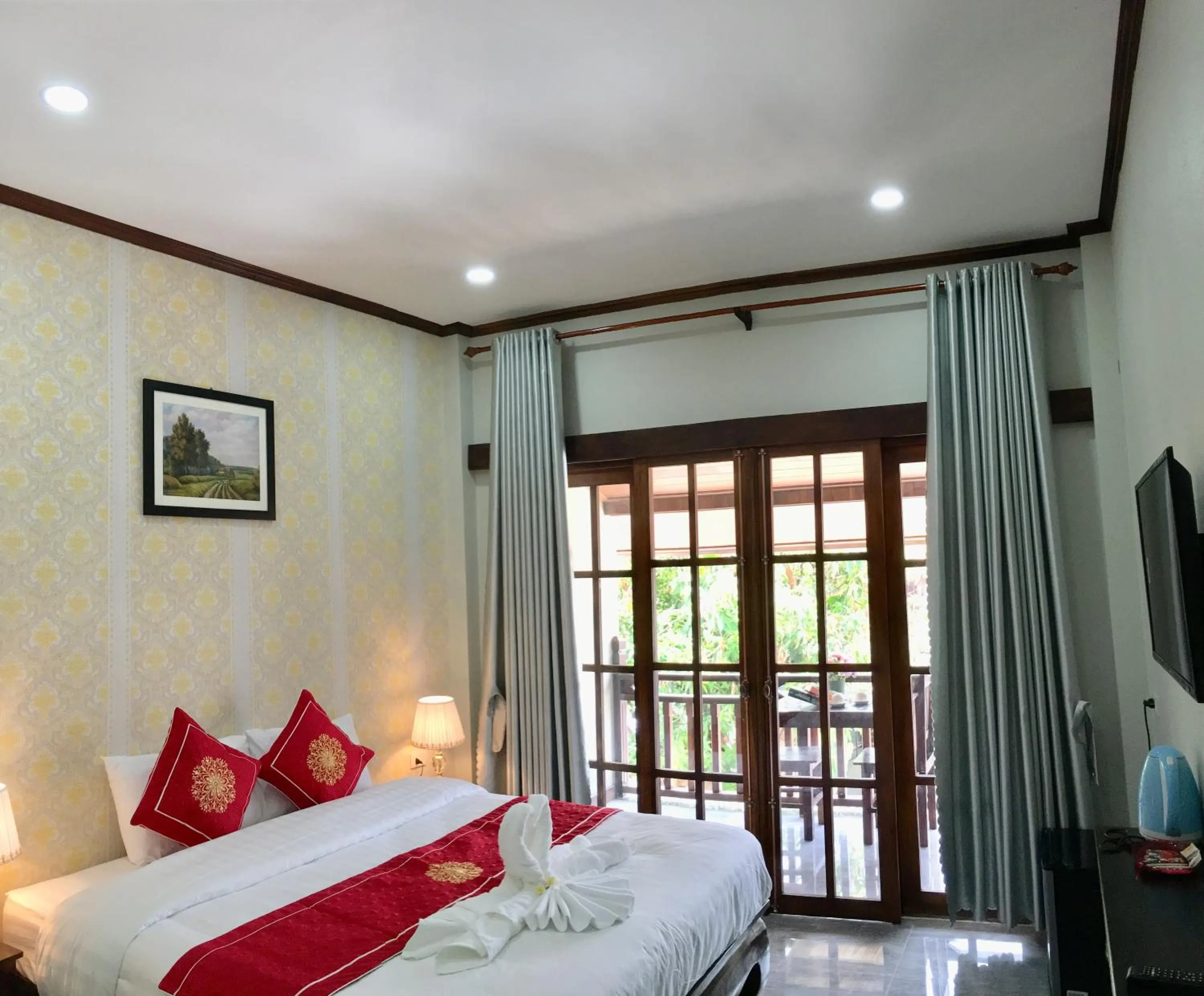 Bed in Le KhounSok Boutique Hotel