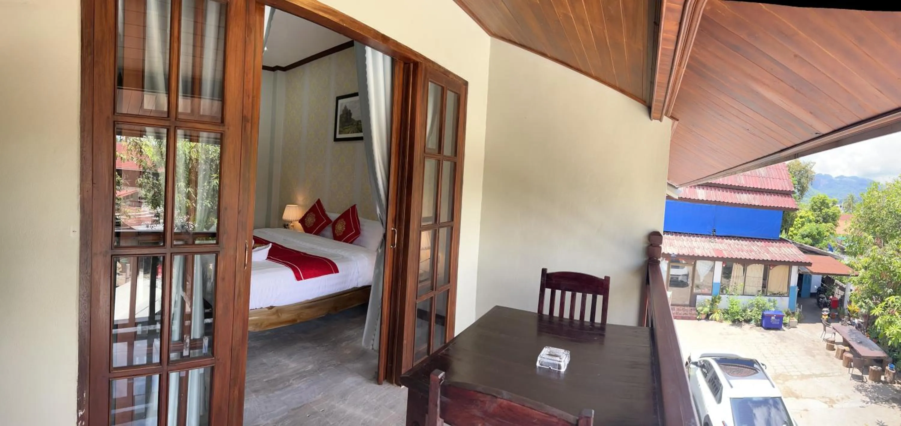 Balcony/Terrace, Bed in Le KhounSok Boutique Hotel