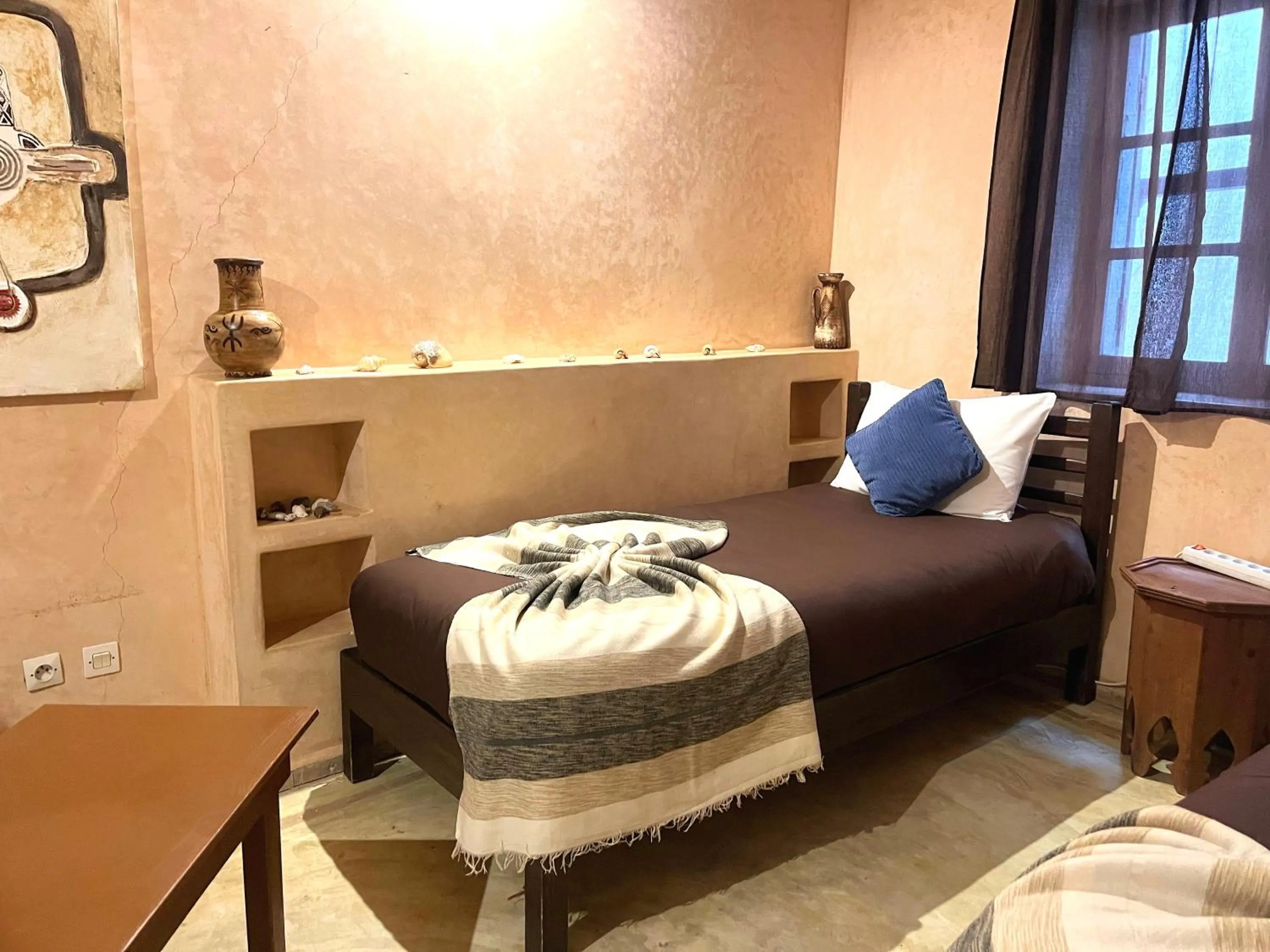 Bed in Riad Dar Latigeo