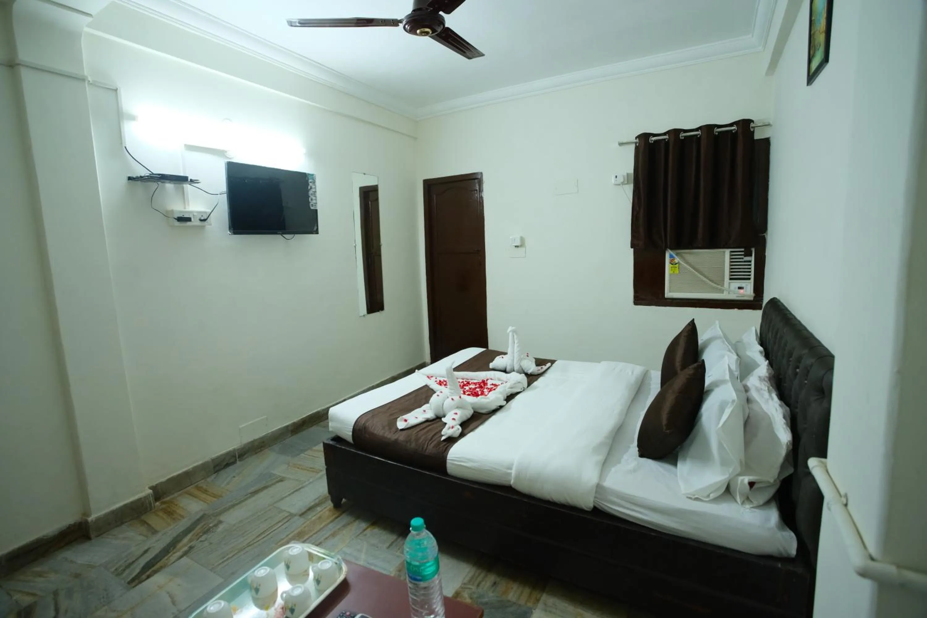 Bed in Ganesh Guest House