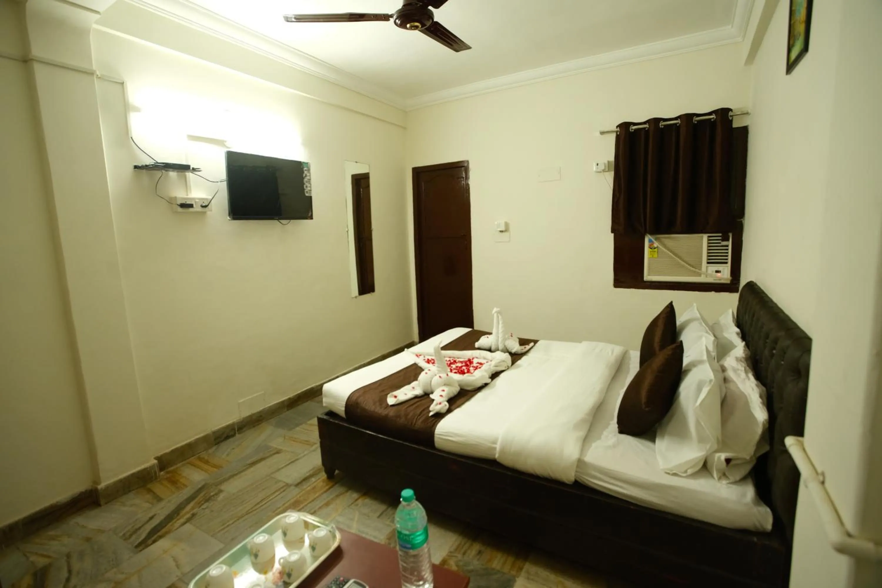 Bed in Ganesh Guest House