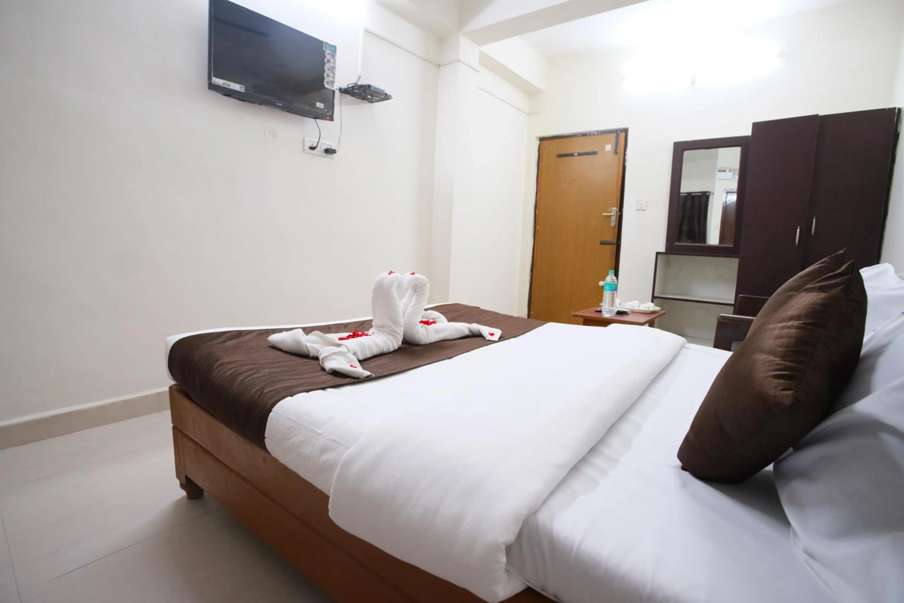 Bed in Ganesh Guest House