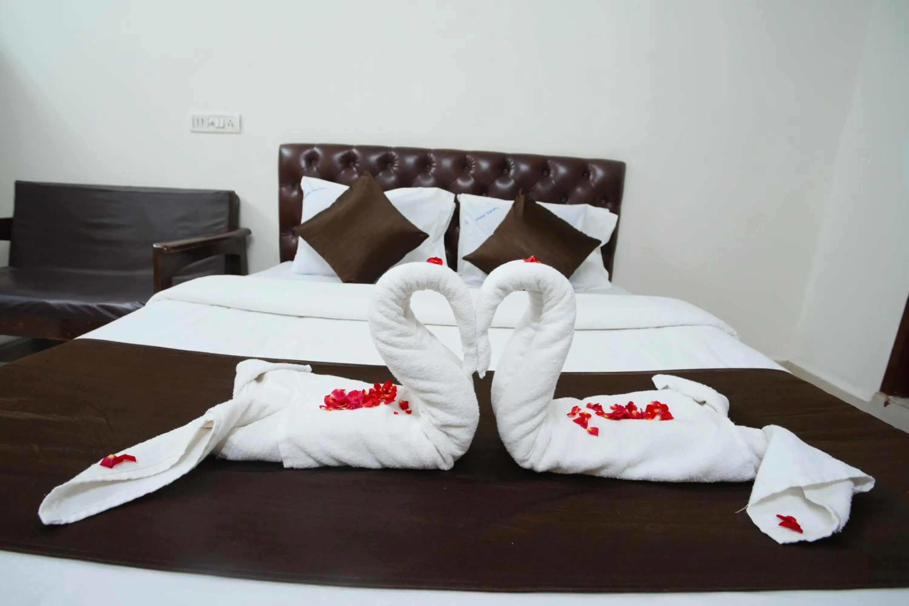 Bed in Ganesh Guest House