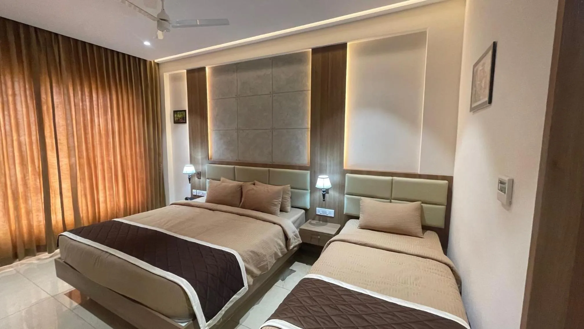 Bed in HOTEL VAHINI GRAND