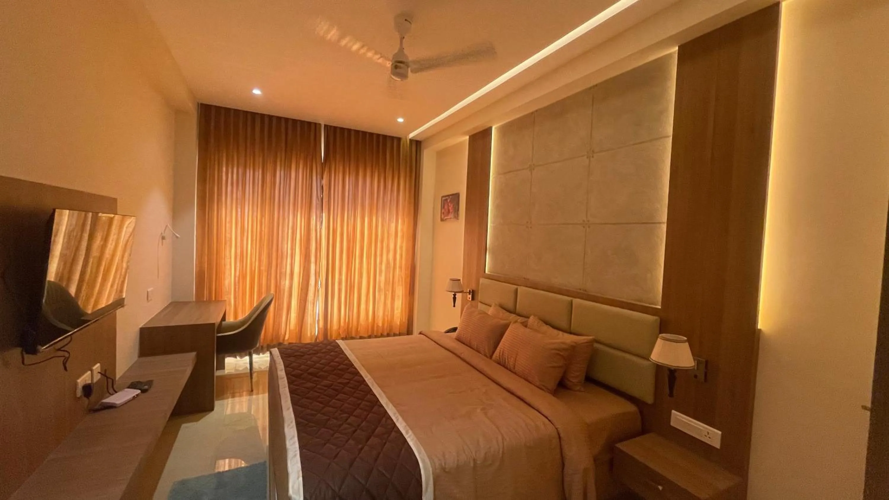 Bed in HOTEL VAHINI GRAND